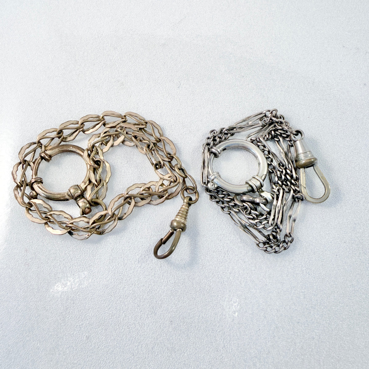Two Antique Metal Watch Chains.
