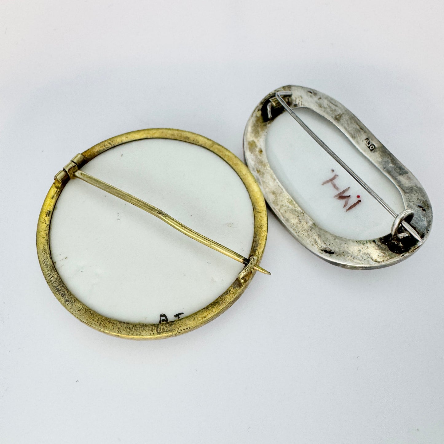 Two Antique ca 1920 Solid Silver Painted Porcelain Floral Brooches.