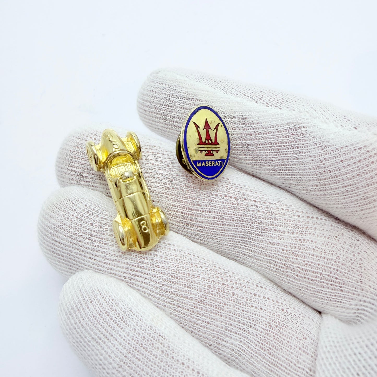 Maserati. Vintage Pin and Miniature Car.