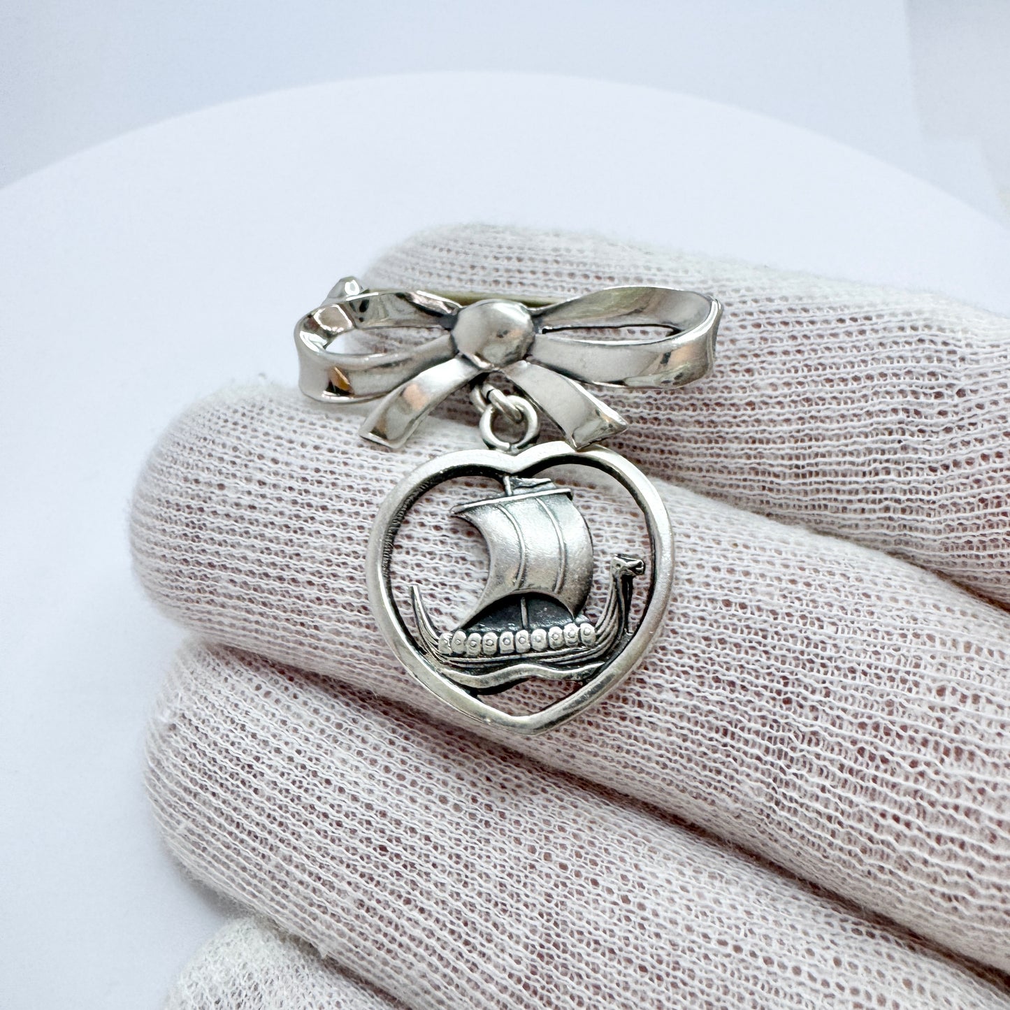 Carl Ove Frydensberg, Denmark 1950s. Vintage Silver Viking-ship Heart Ribbon Brooch.