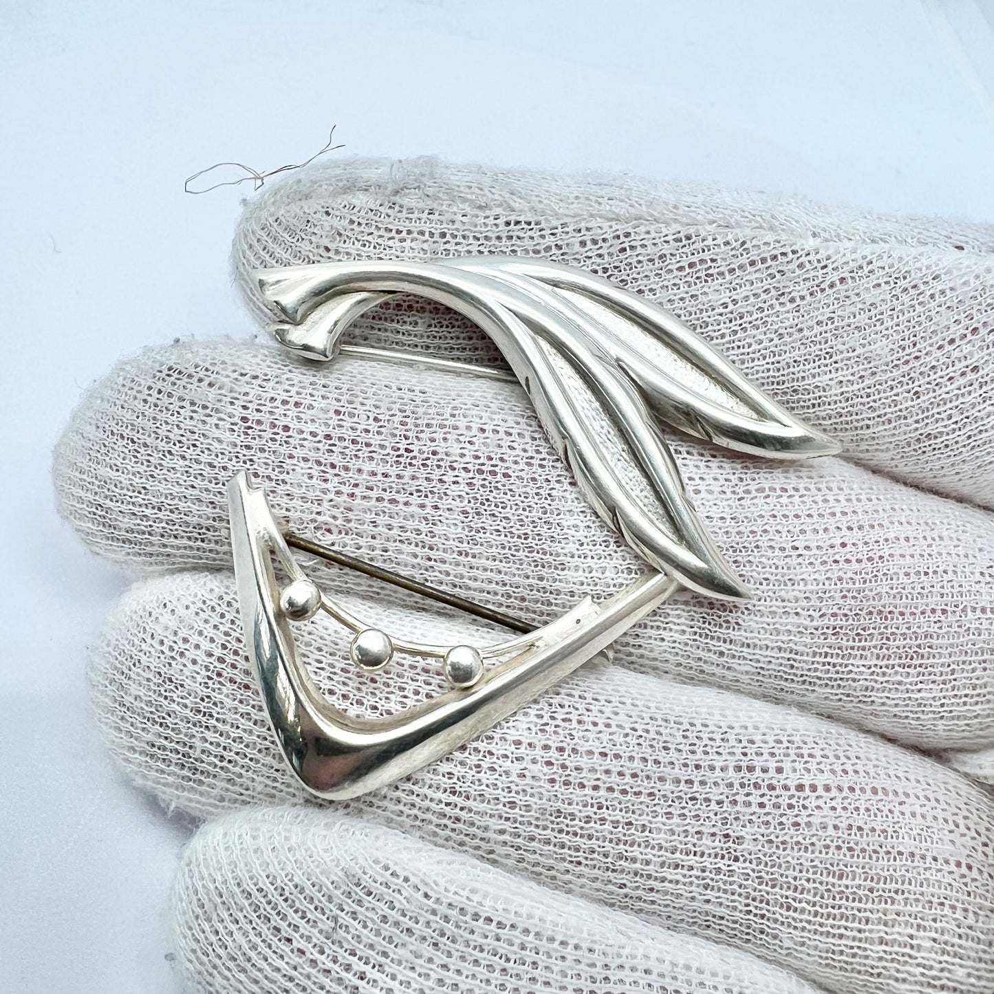 Finland 1950-60s. Two Solid Silver Brooches.