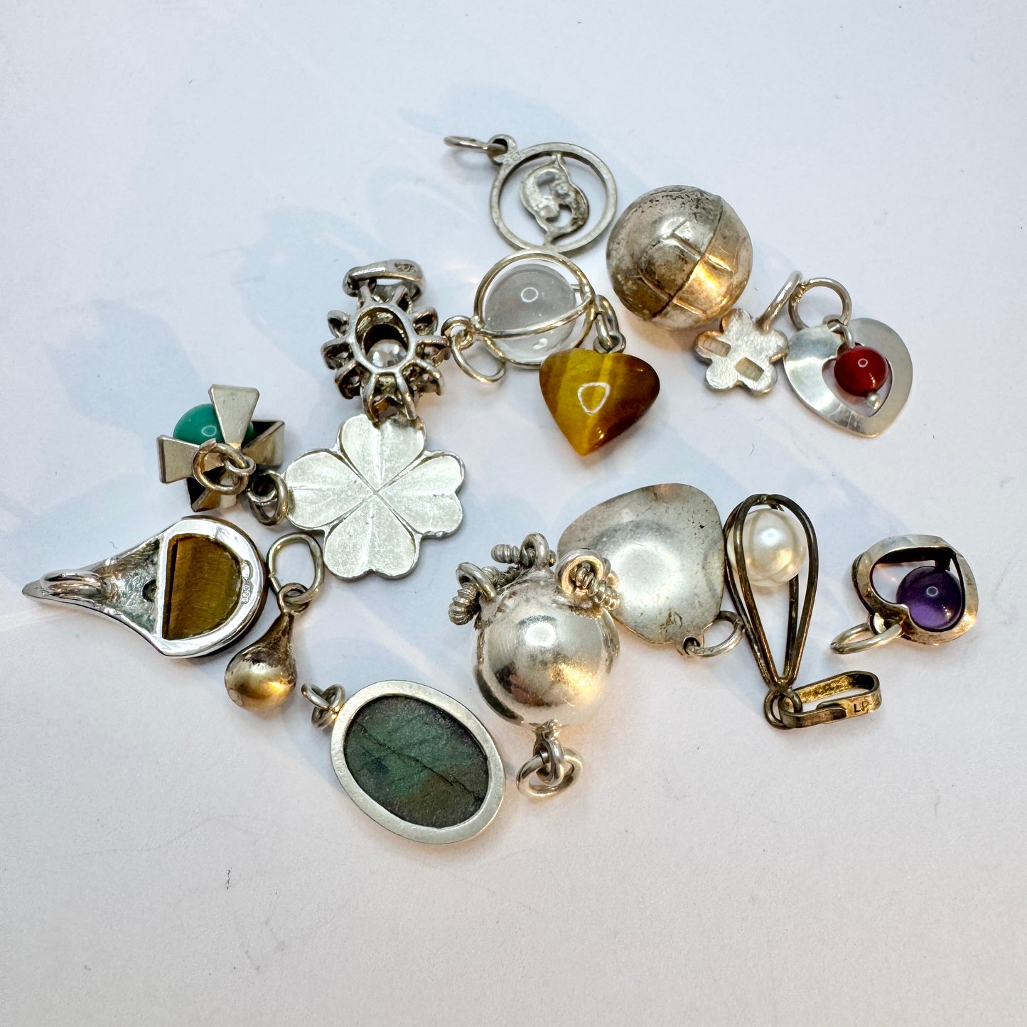 Job Lot. 16 Vintage Solid Silver Charms / Pendants.