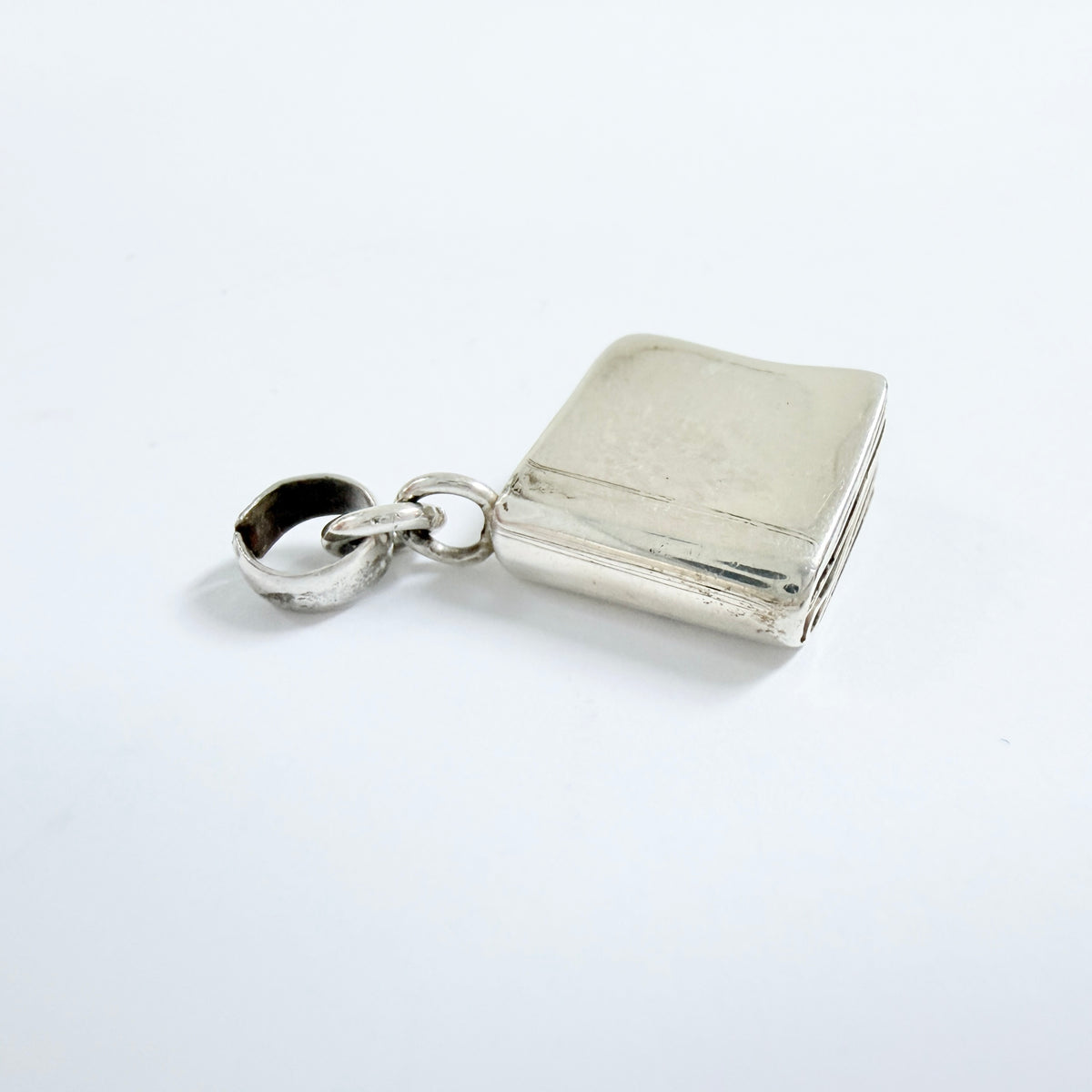 Karin Ferner, Sweden 1993. Vintage Sterling Silver Book Pendant. Signed.