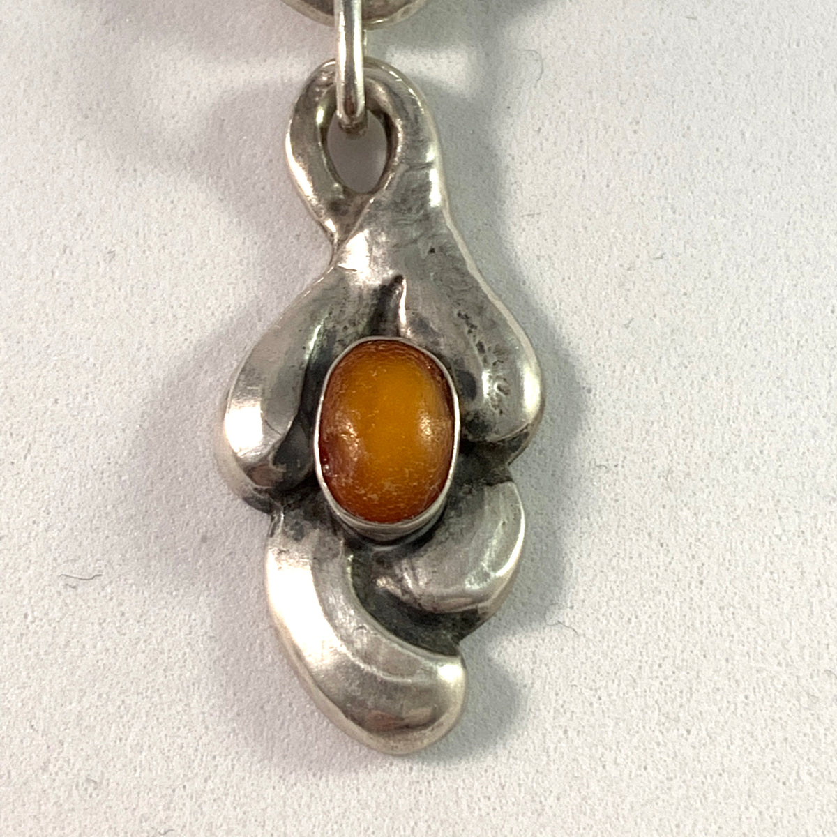 Knud Georg Jensen, Denmark c 1910s Arts and Crafts Skonvirke 826 Silver Amber Brooch.