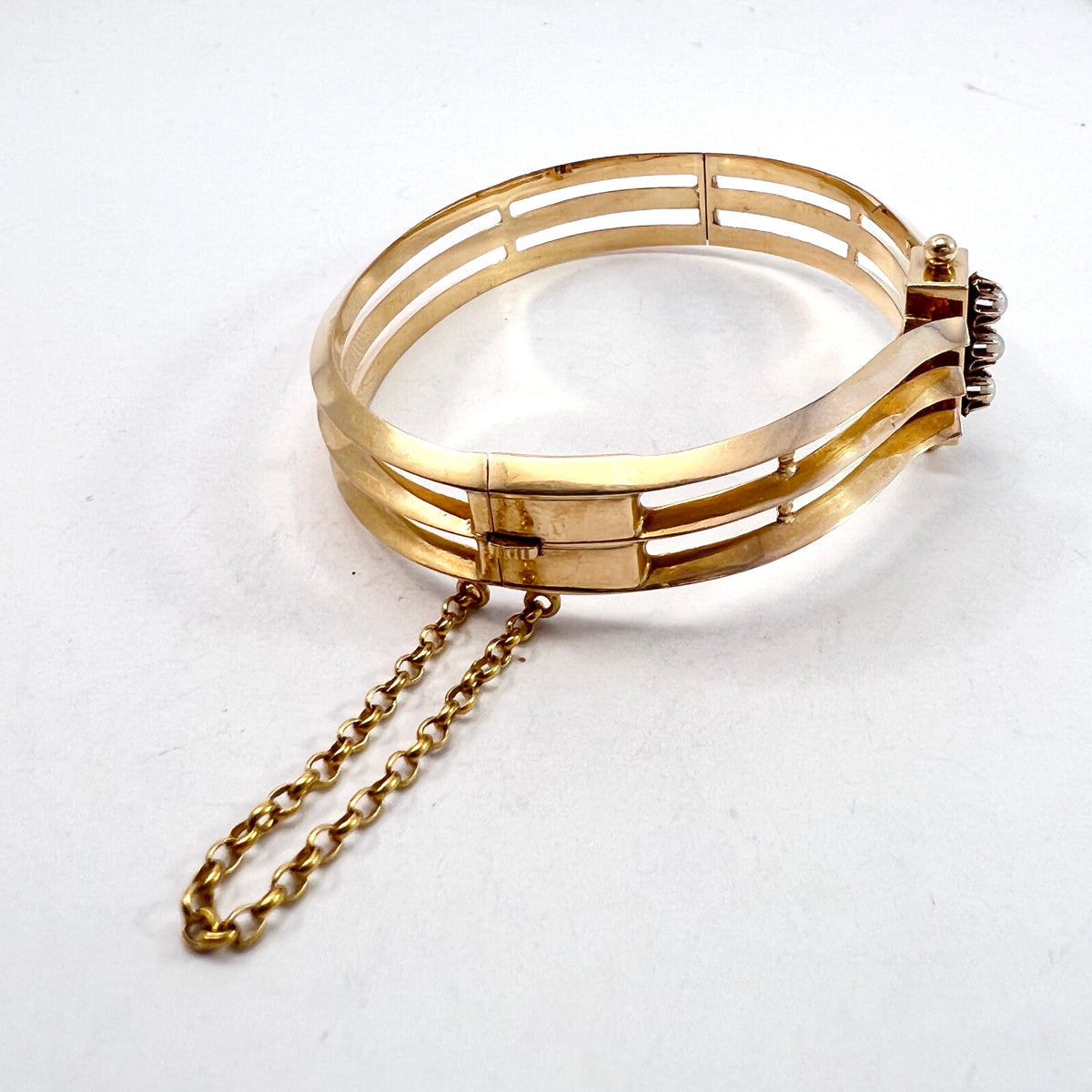 L Larsson, Sweden 1888. Antique Victorian 18k Gold Pearl Hinged Bangle Bracelet.
