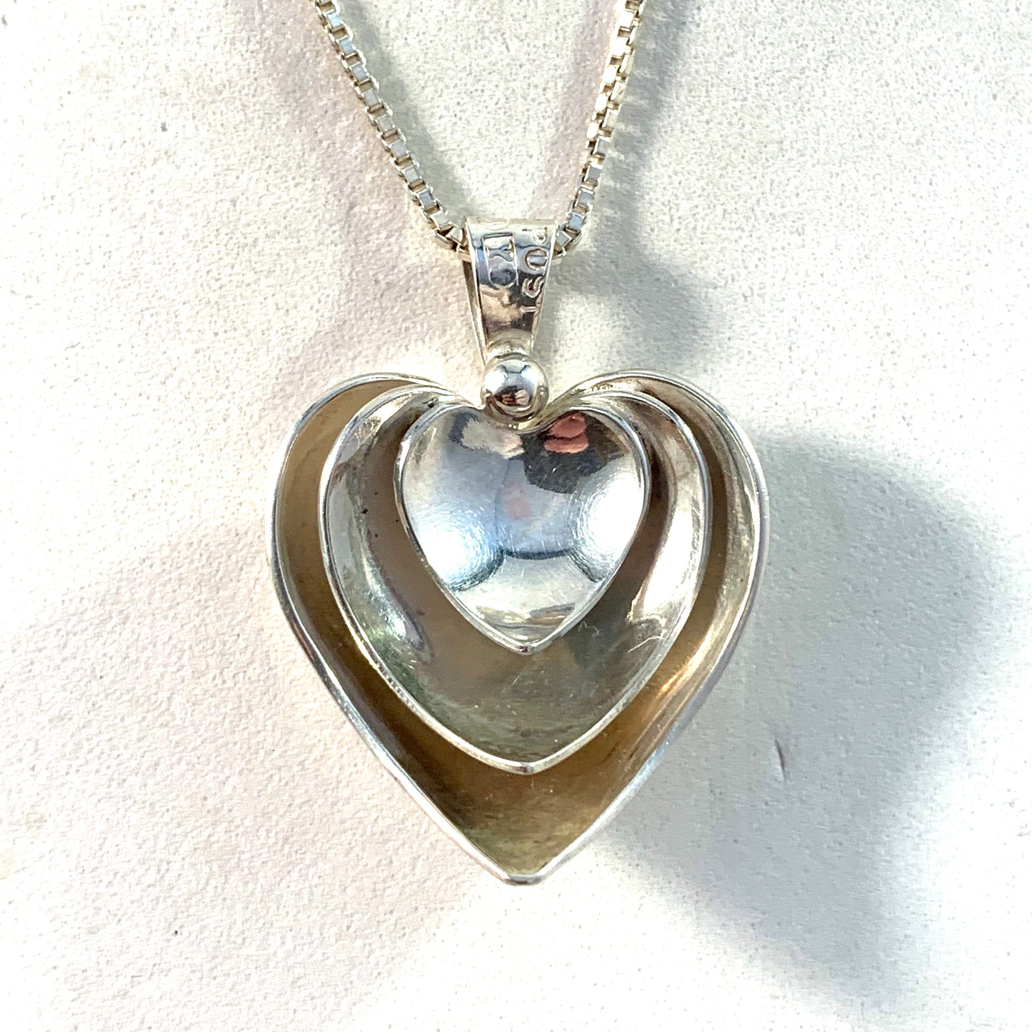 Peter Von Post, Stockholm 1973 Solid Silver Three Hearts Pendant Necklace. Signed