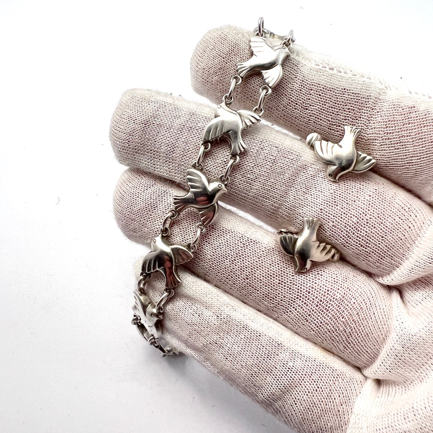 Emil Snedker, Copenhagen 1918-37. Sterling Silver Peace Dove Necklace and Earrings.