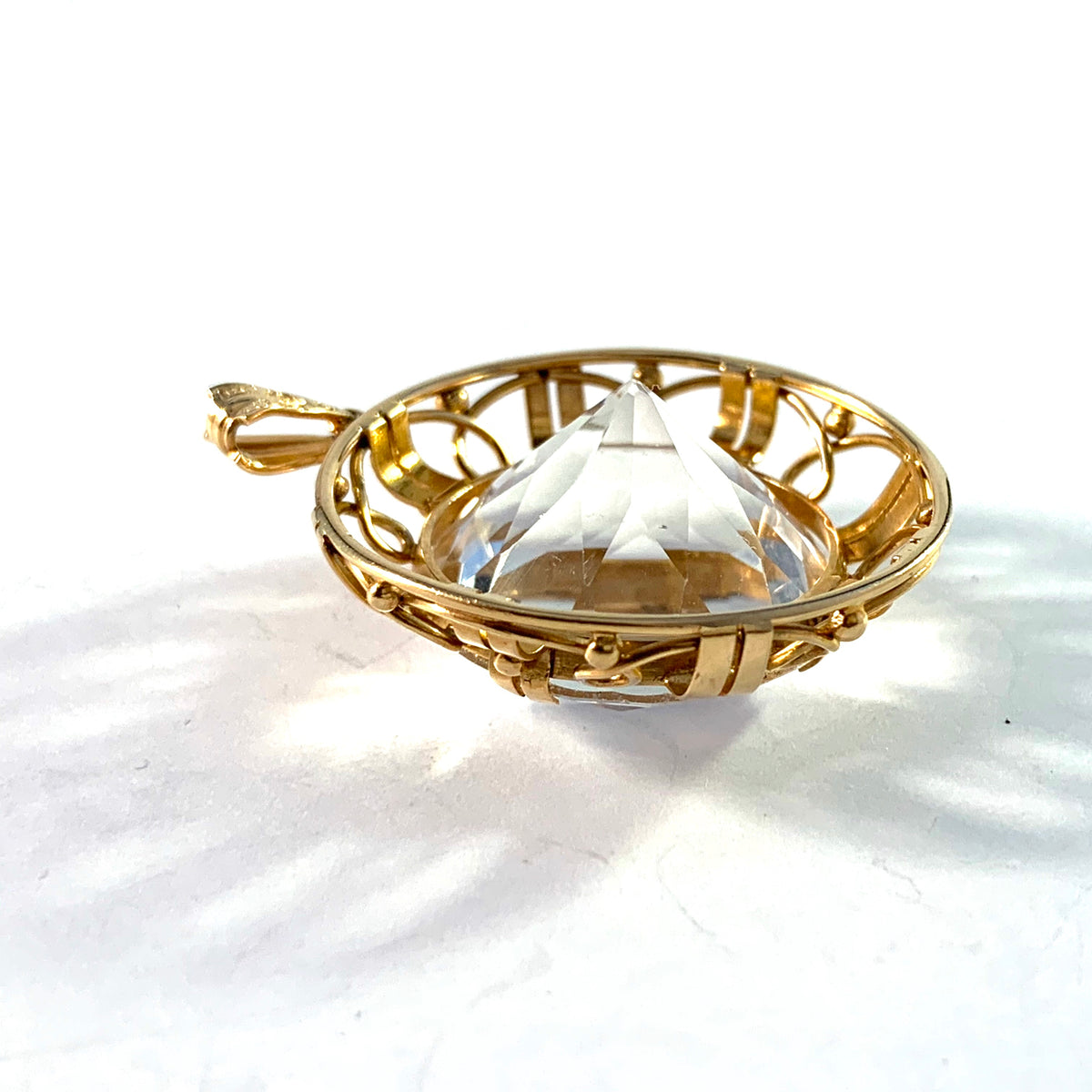 ヘリベルト・エンゲルベルト、ストックホルム、1948 年ミッドセンチュリー 18K ゴールド ロッククリスタル ペンダント。