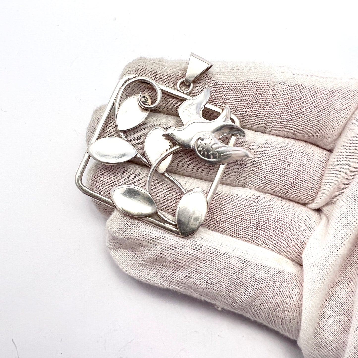 Hugo Grun, Stockholm 1946. Vintage Celebrating Peace Sterling Silver Pendant.