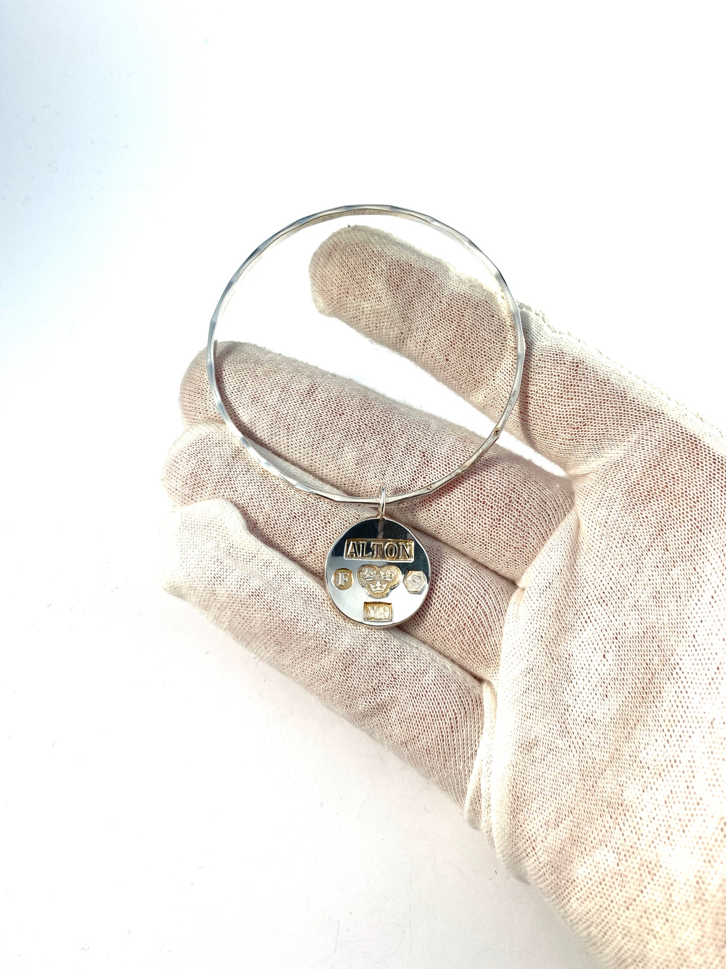 Alton, Sweden 1973. Sterling Silver Charm Bangle Bracelet.