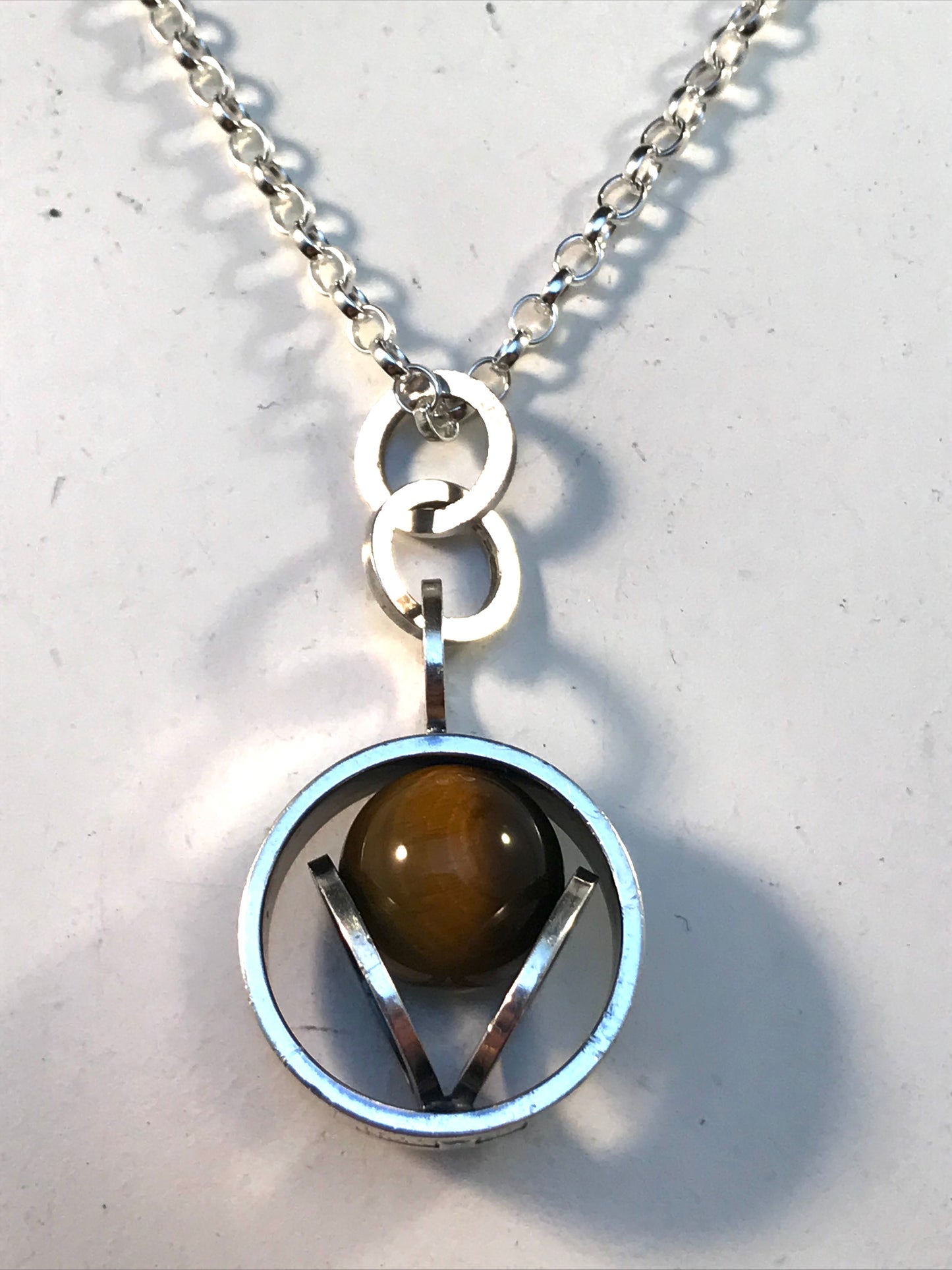 Elis Kauppi Finland 1966 Sterling Silver Spinning Tiger Eye Pendant Necklace.