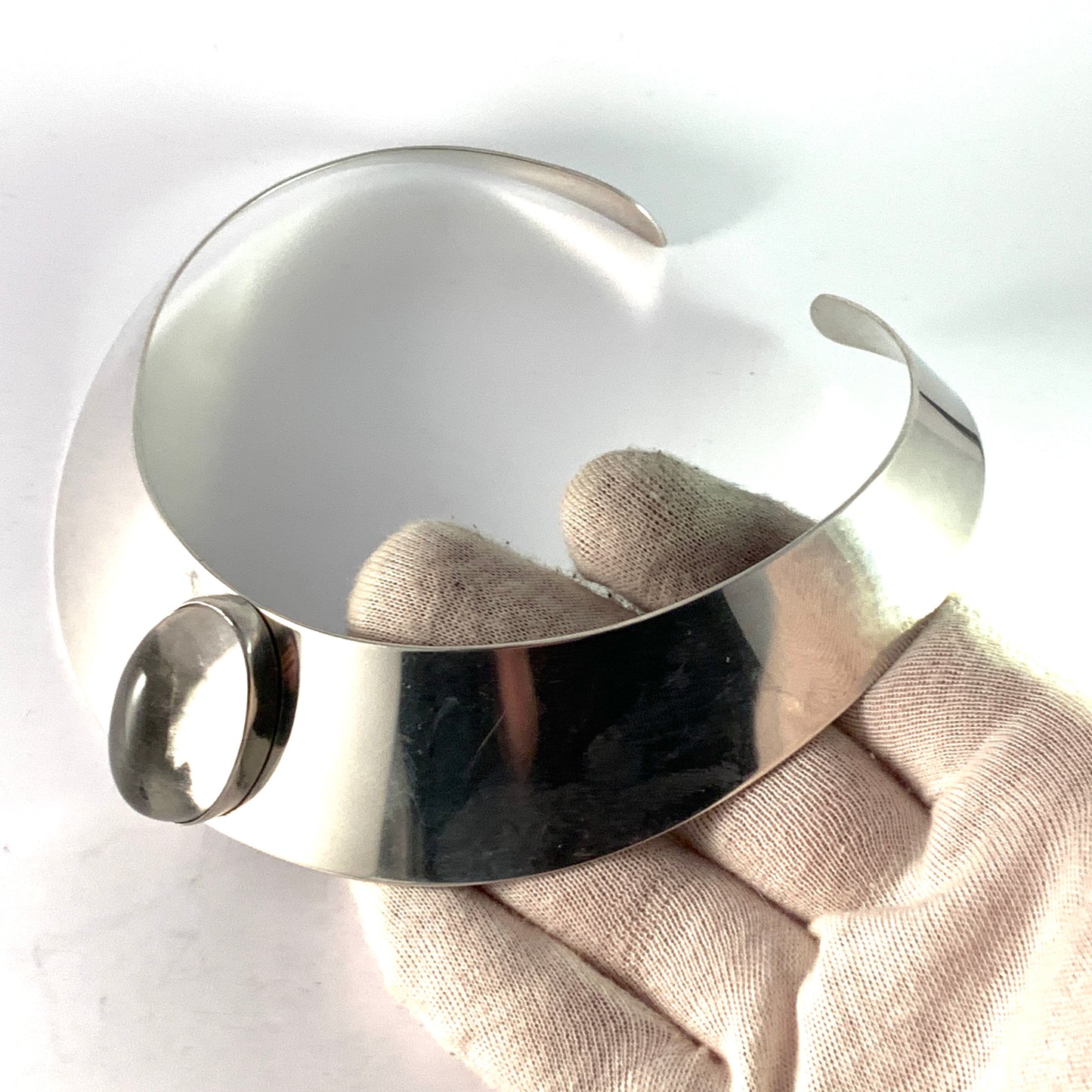 Isaac Cohen, Stockholm 1967. Bold Sterling Silver Rock Crystal Torque Necklace. Signed