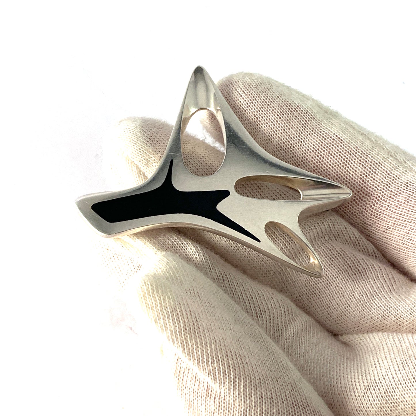 Georg Jensen, Design Henning Koppel 1956. Sterling Silver Black Enamel Brooch.