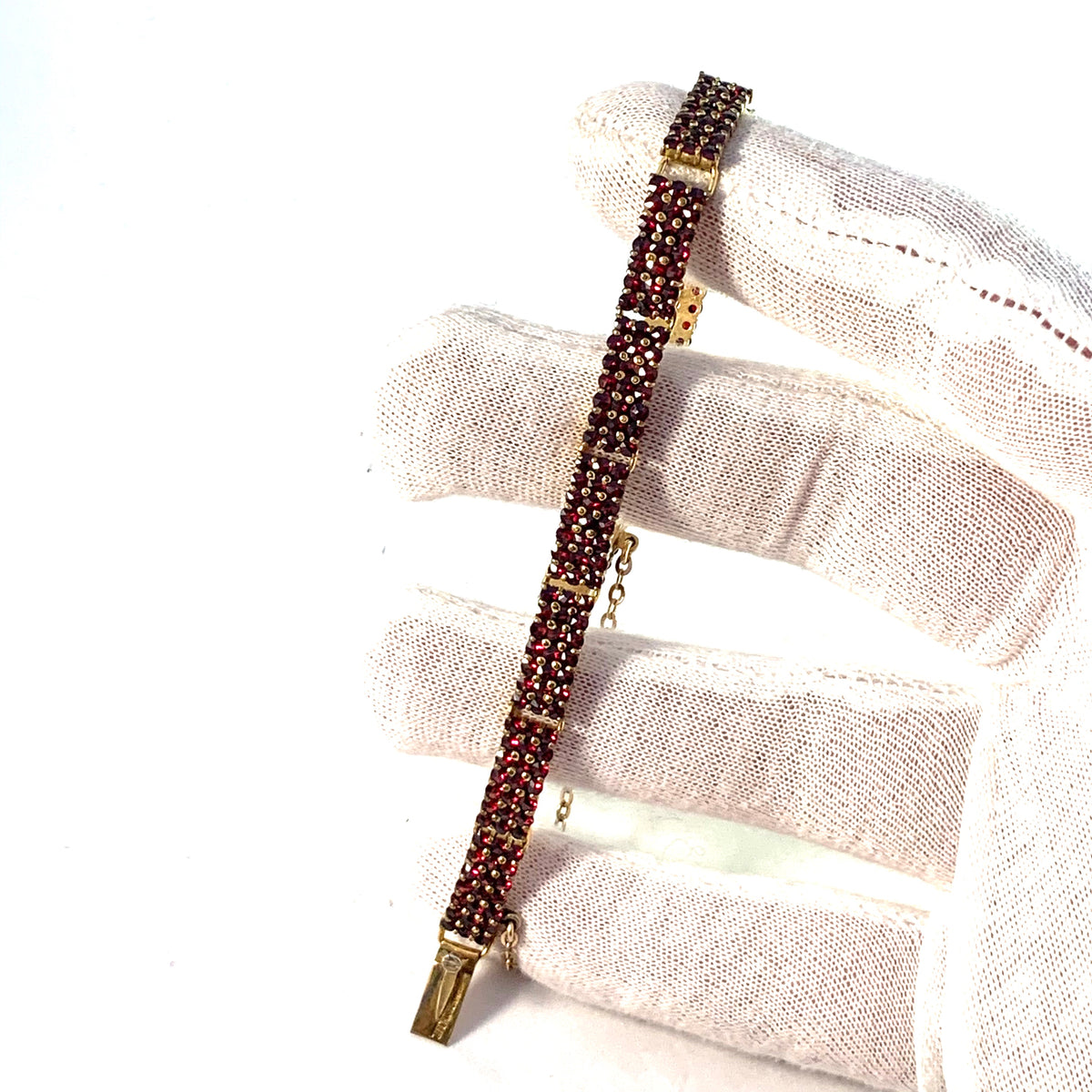 Marked Czechoslovakia, early 1900s Garnet Gilt Metal Bracelet.
