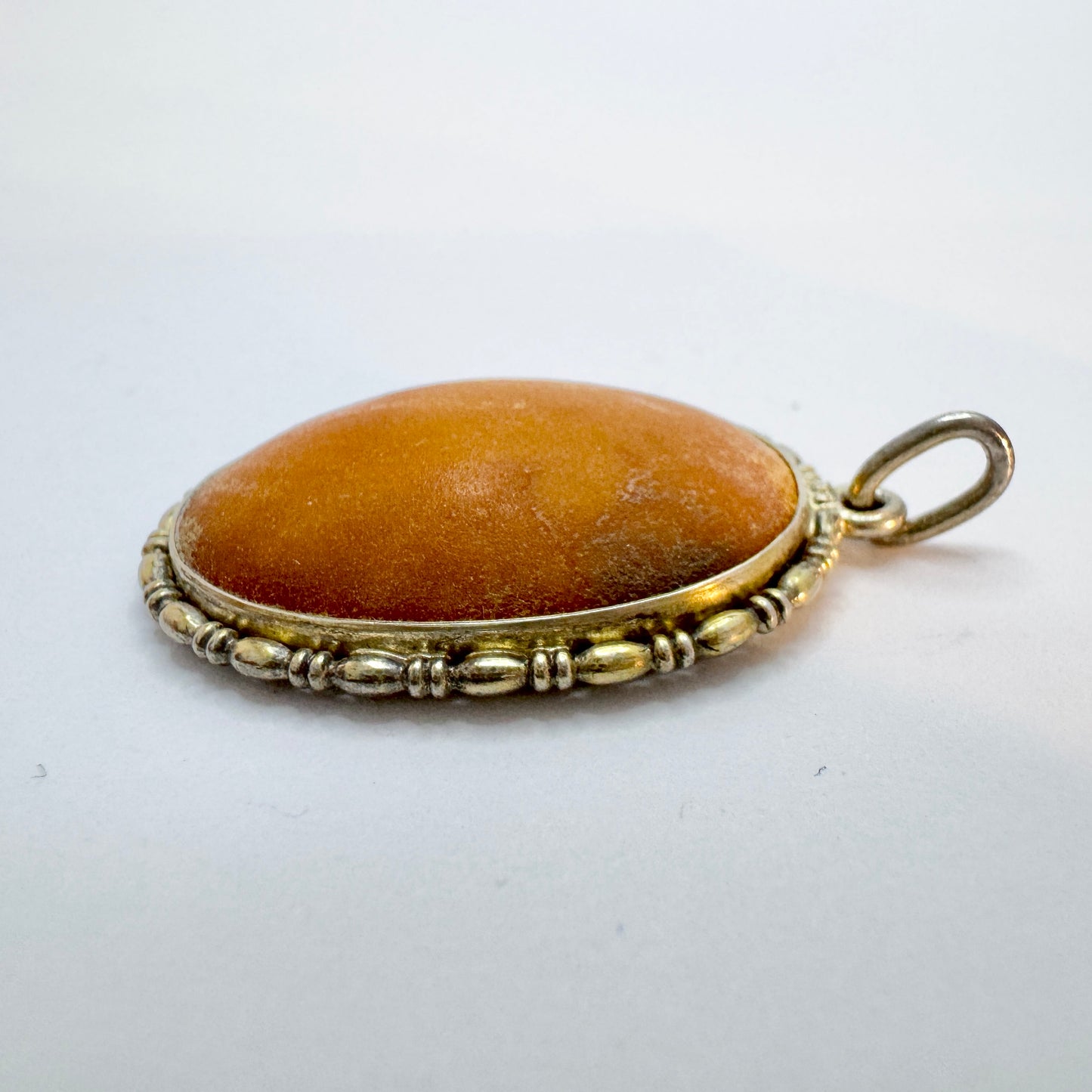 Vintage c 1930 Solid Silver Amber Pendant.