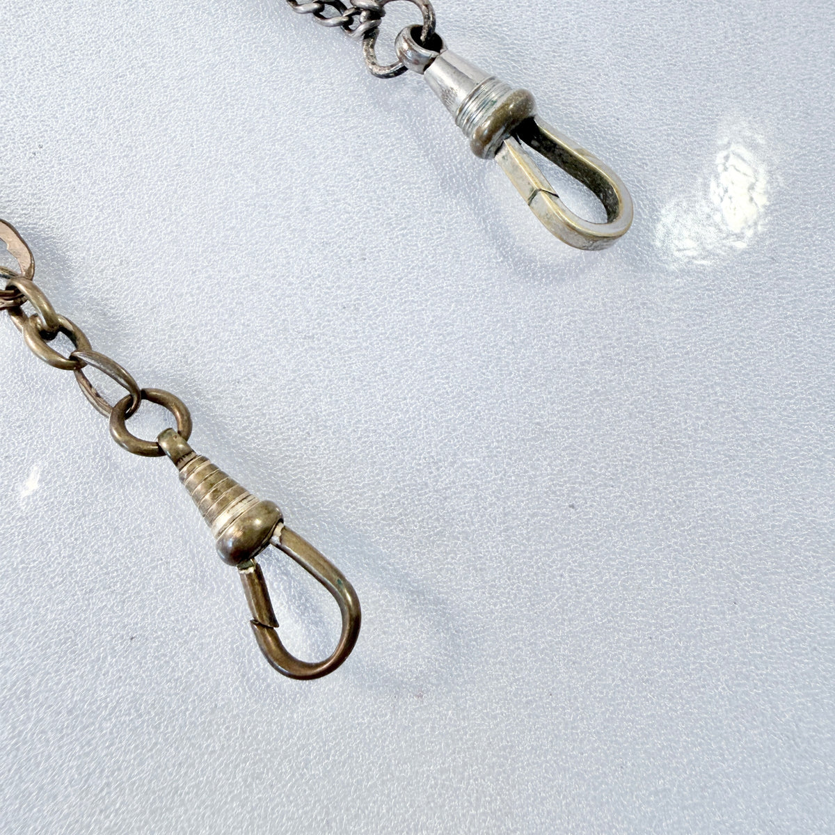 Two Antique Metal Watch Chains.