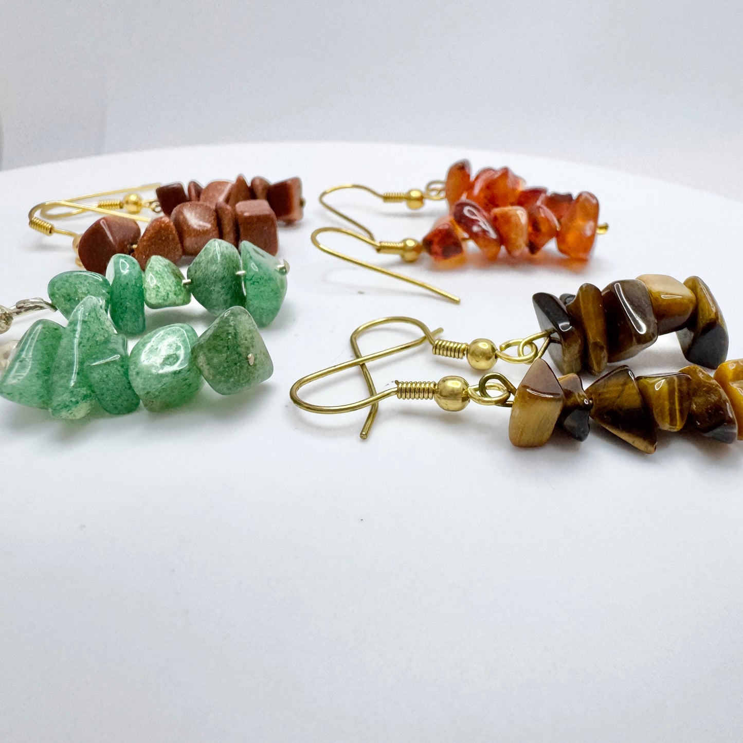 Four Pair of Earrings. Aventurine. Tiger's Eye. Carnelian and Goldstone.