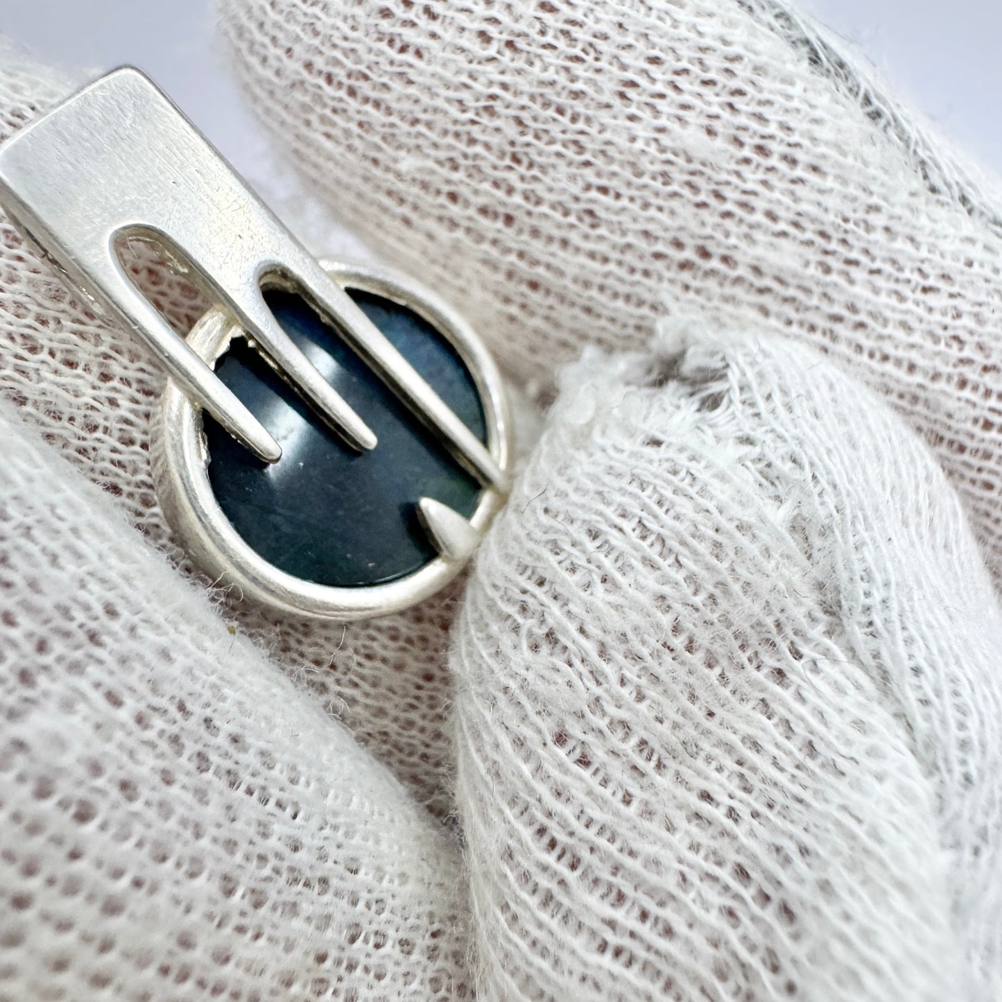 Finland. Four Small Vintage Solid Silver Pendants.