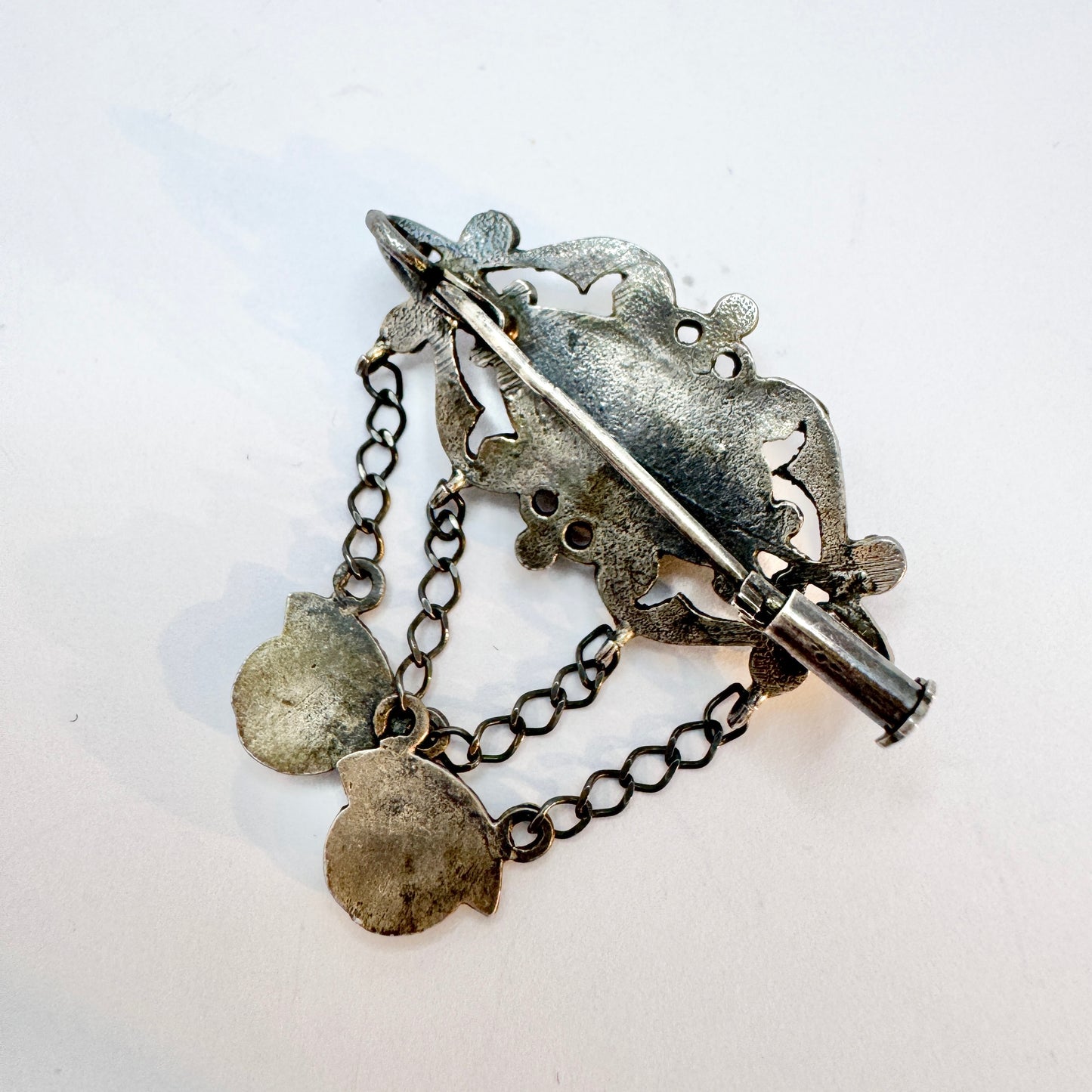 Early to Mid 1900s. Solid Silver Onyx Brooch.