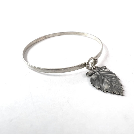 Kultateollisus, Finland 1964. Solid Silver Charm Bangle Bracelet.