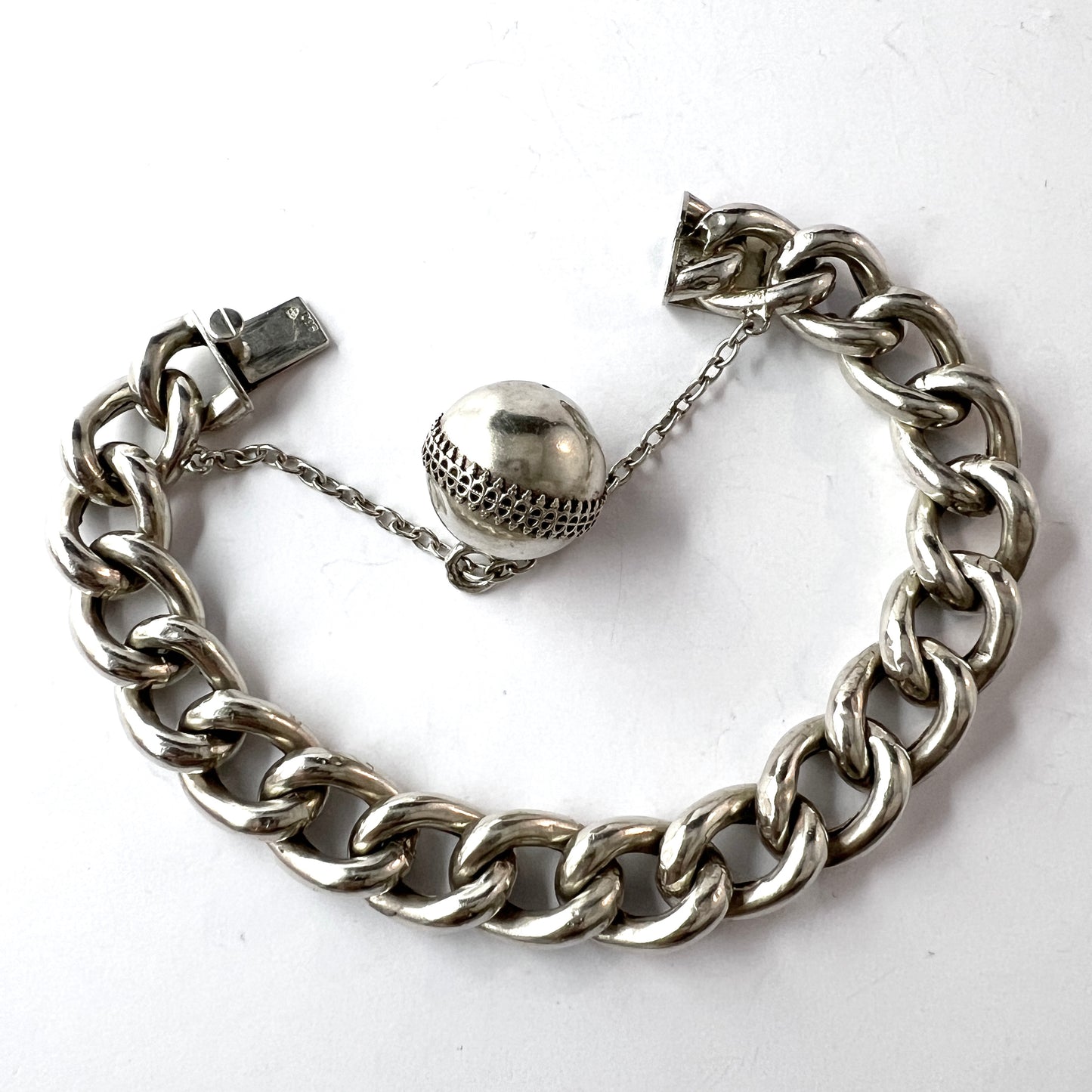 Sweden early 1900s. Antique Memory Silver Bracelet with Troll Ball Charm