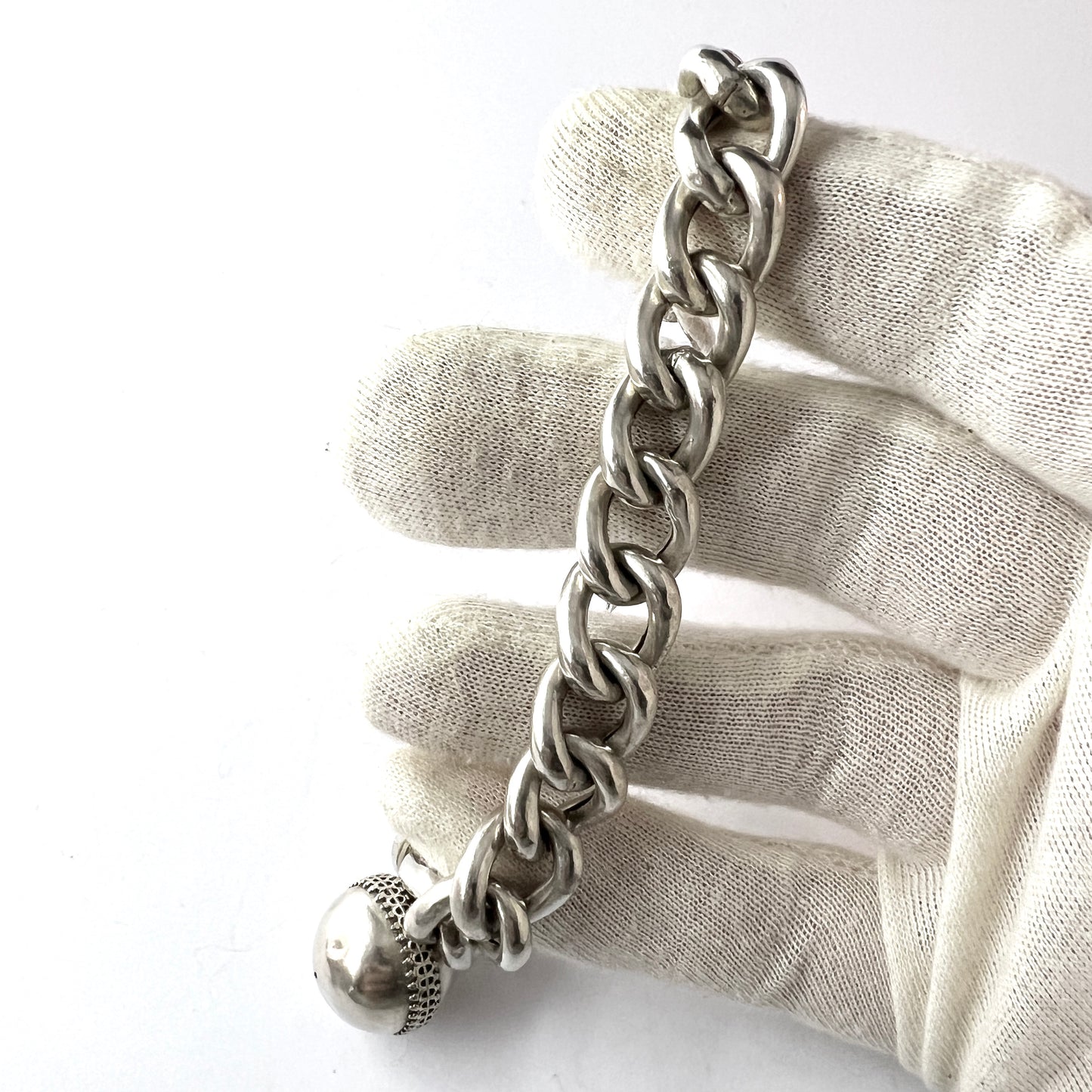 Sweden early 1900s. Antique Memory Silver Bracelet with Troll Ball Charm