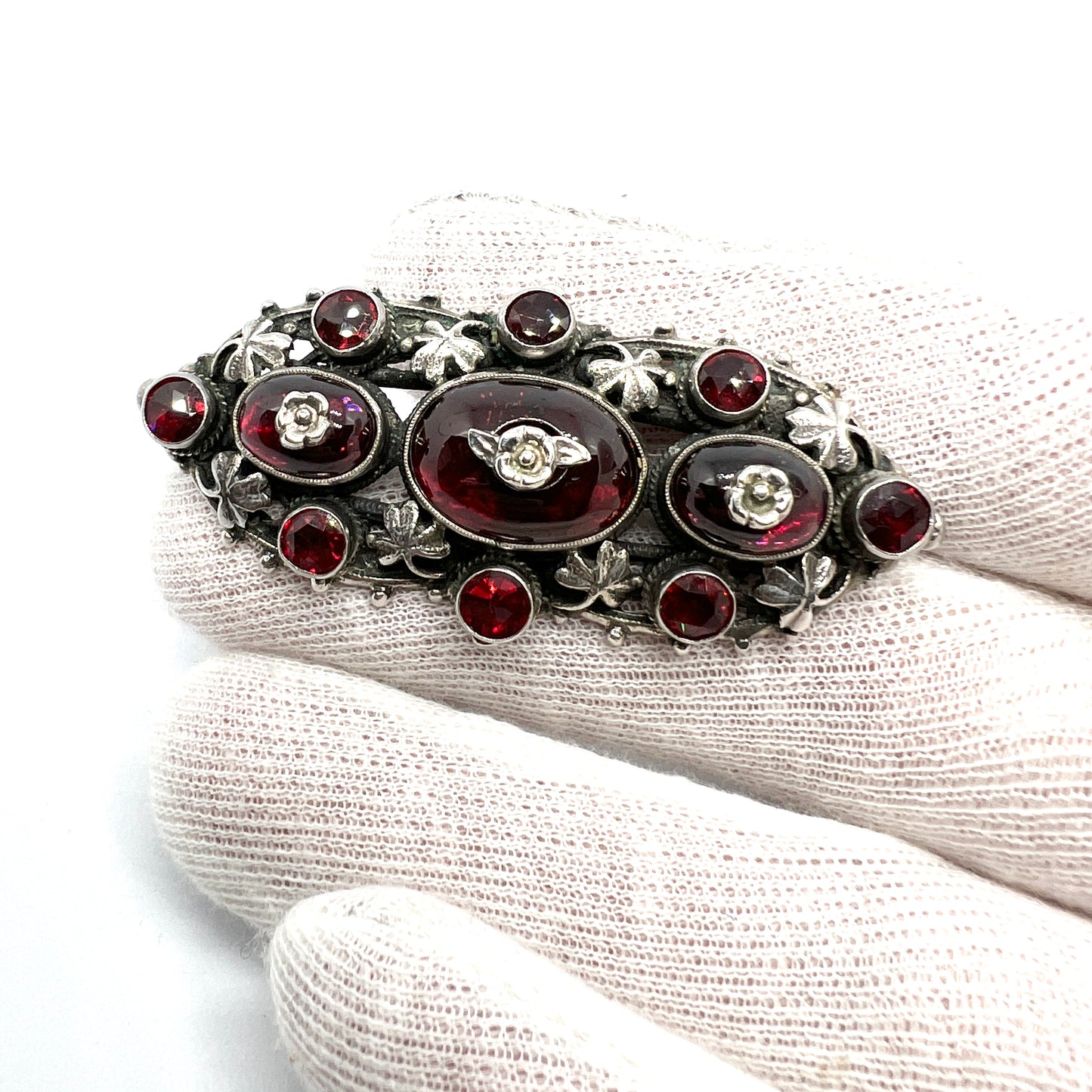 Zoltan White & Co, England c 1920s Arts and Crafts Sterling Silver Garnet Brooch.