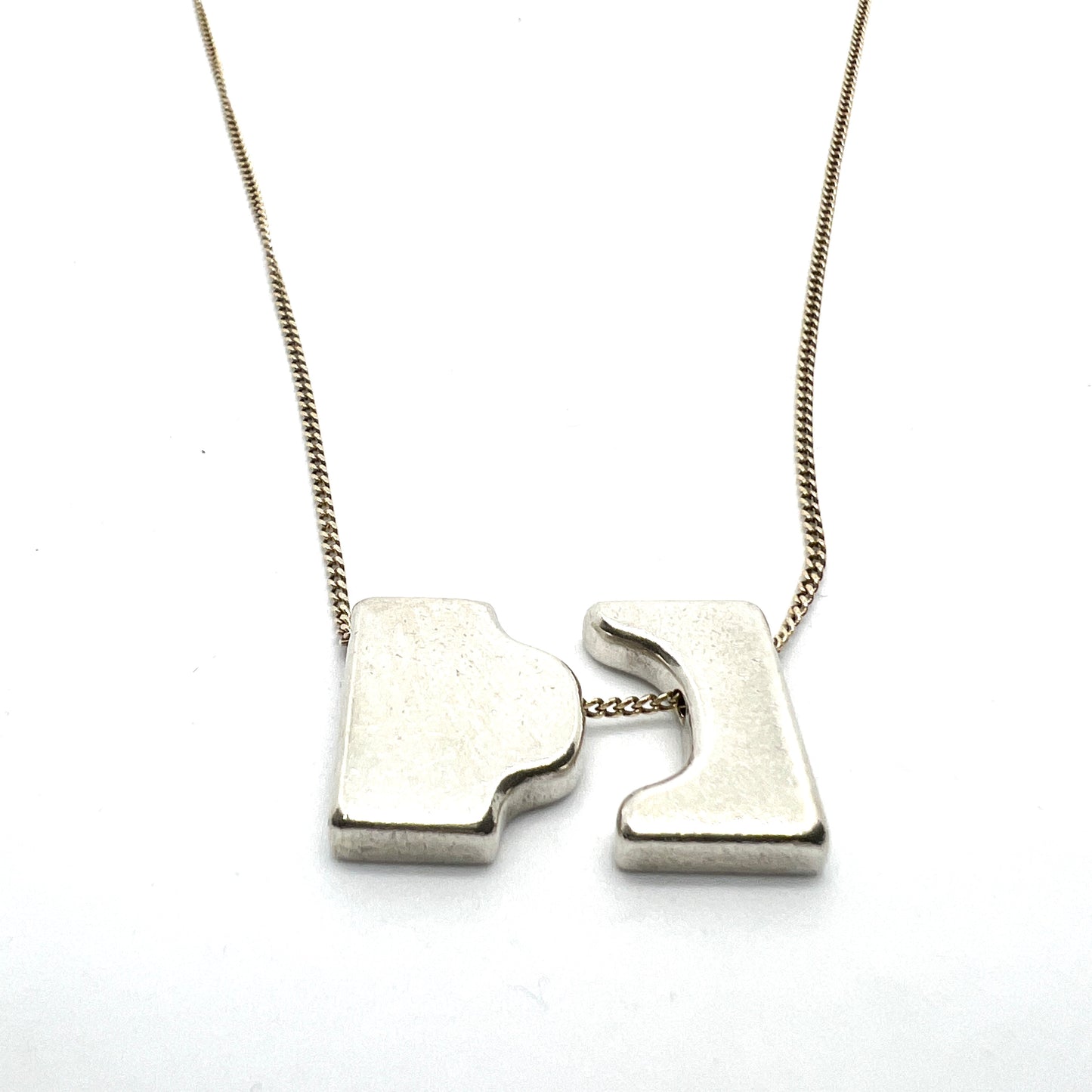 Anton Michelsen, Denmark 1960s. Sterling Silver Pendant. 18k Gold Chain.