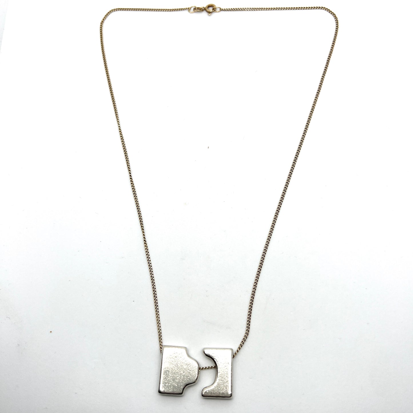 Anton Michelsen, Denmark 1960s. Sterling Silver Pendant. 18k Gold Chain.