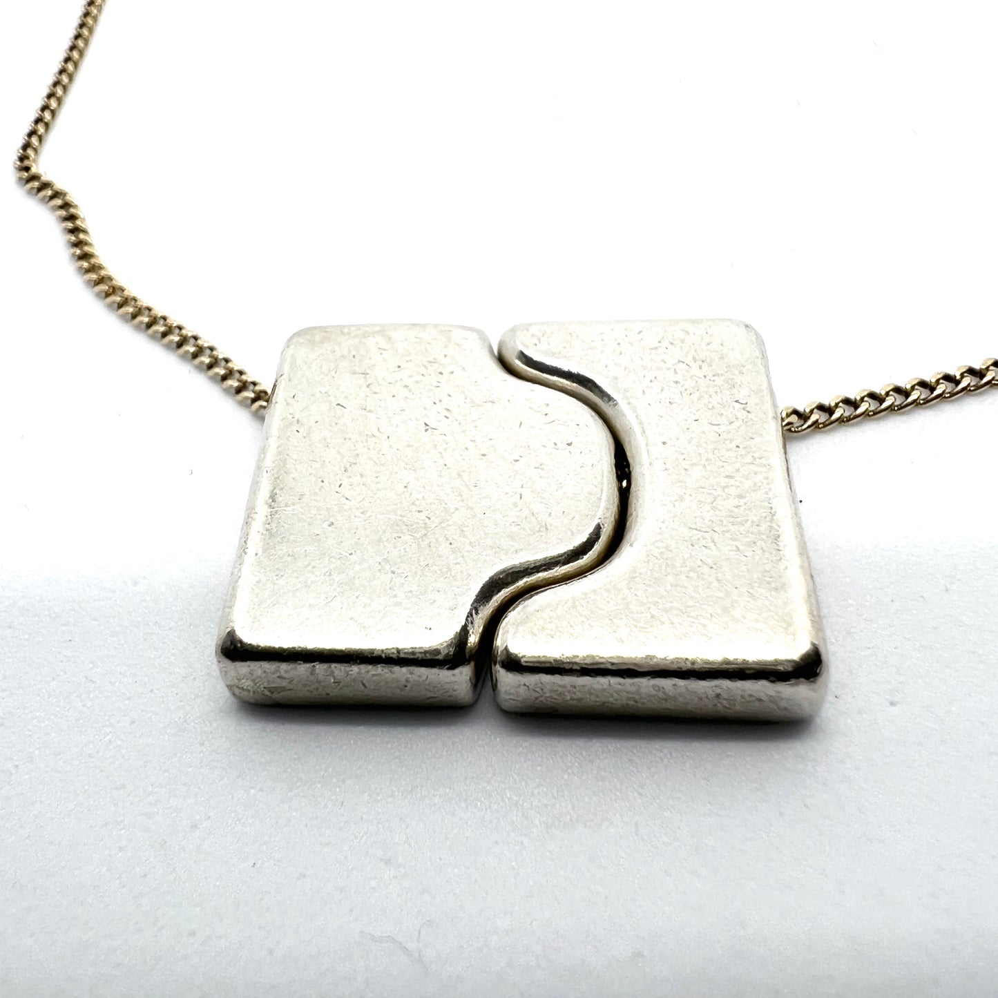 Anton Michelsen, Denmark 1960s. Sterling Silver Pendant. 18k Gold Chain.