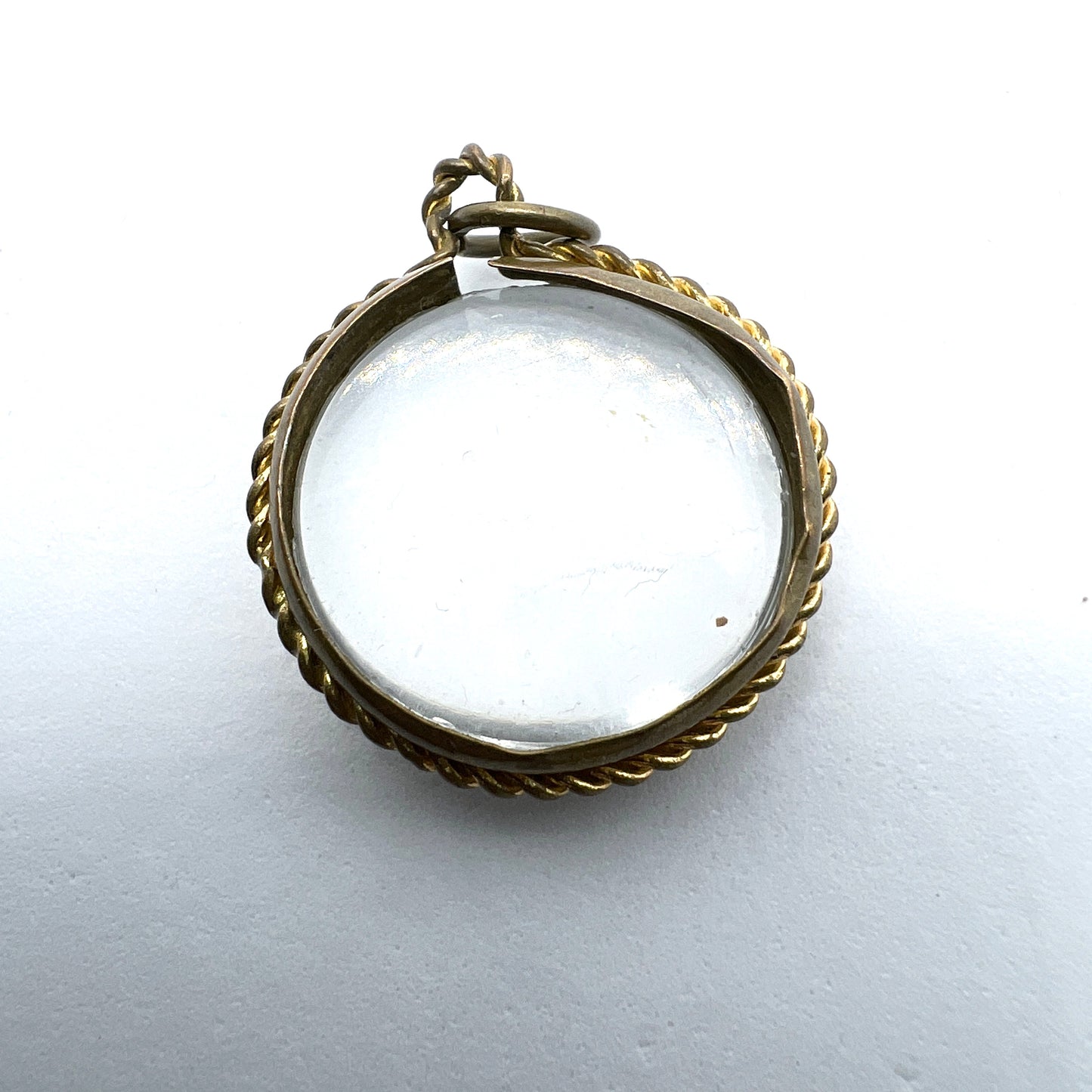 Antique Victorian Pool of Light Locket Pendant. Glass and Yellow Metal.