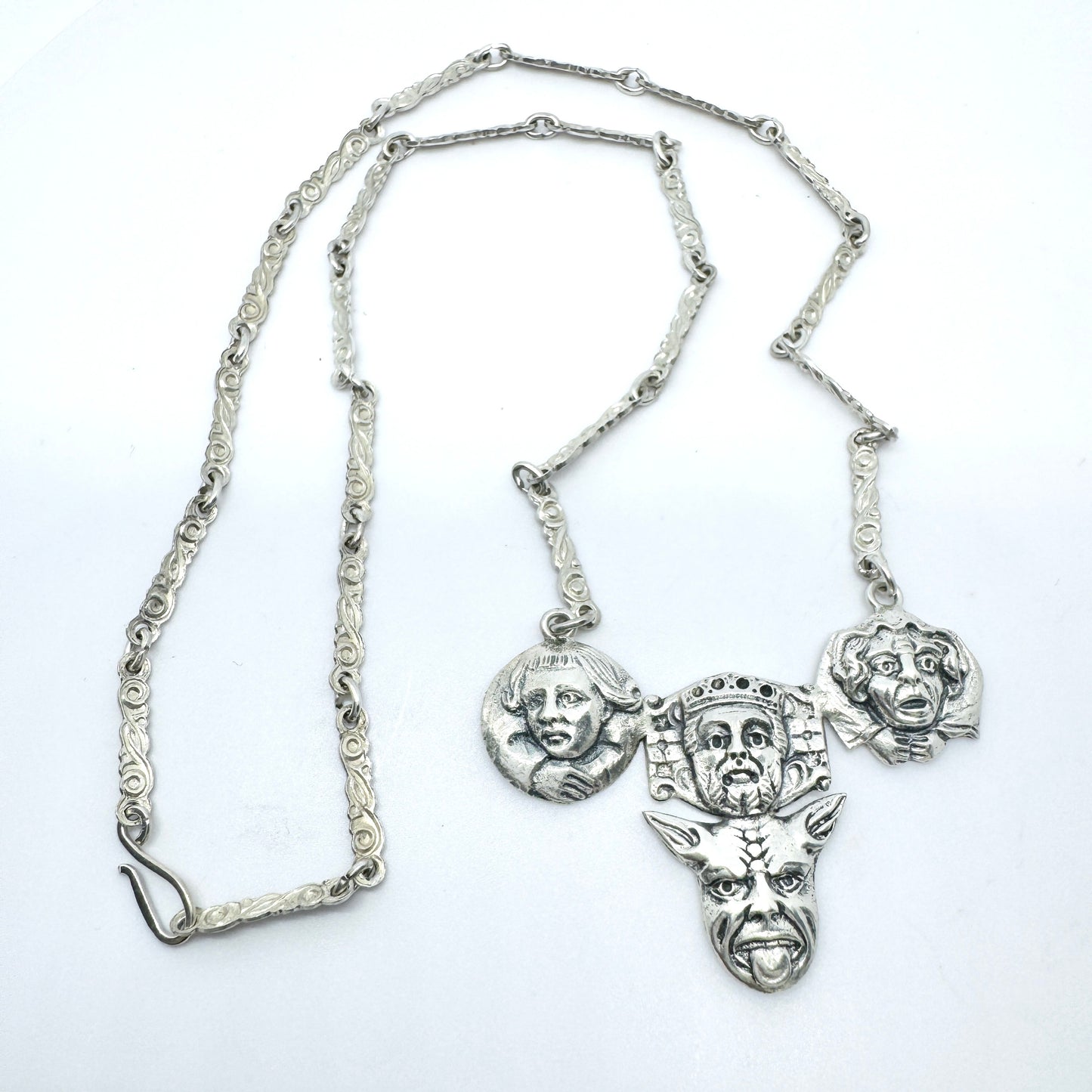 C&S, Norway c year 1900. Antique Solid Silver Faces Pendant Necklace.