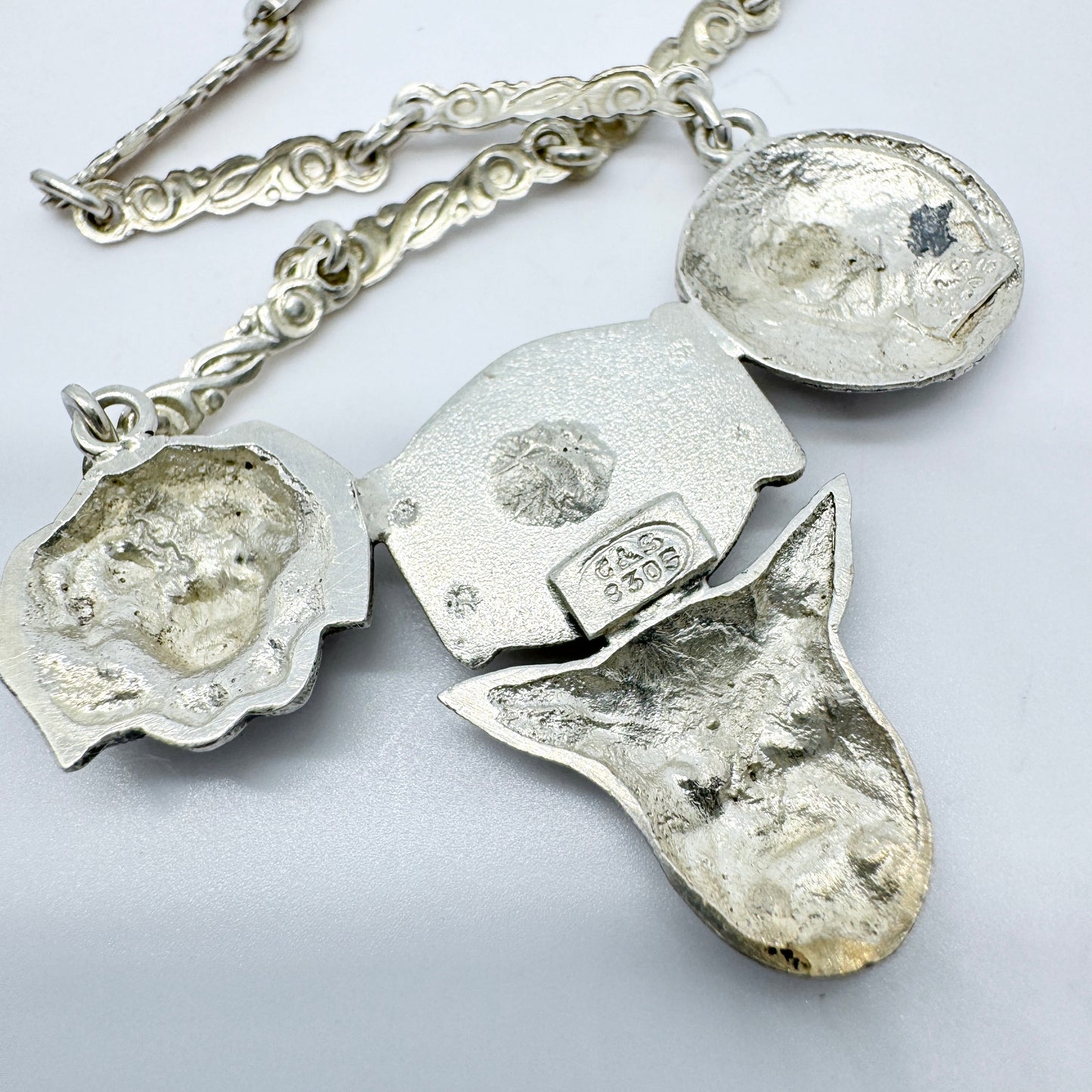 C&S, Norway c year 1900. Antique Solid Silver Faces Pendant Necklace.