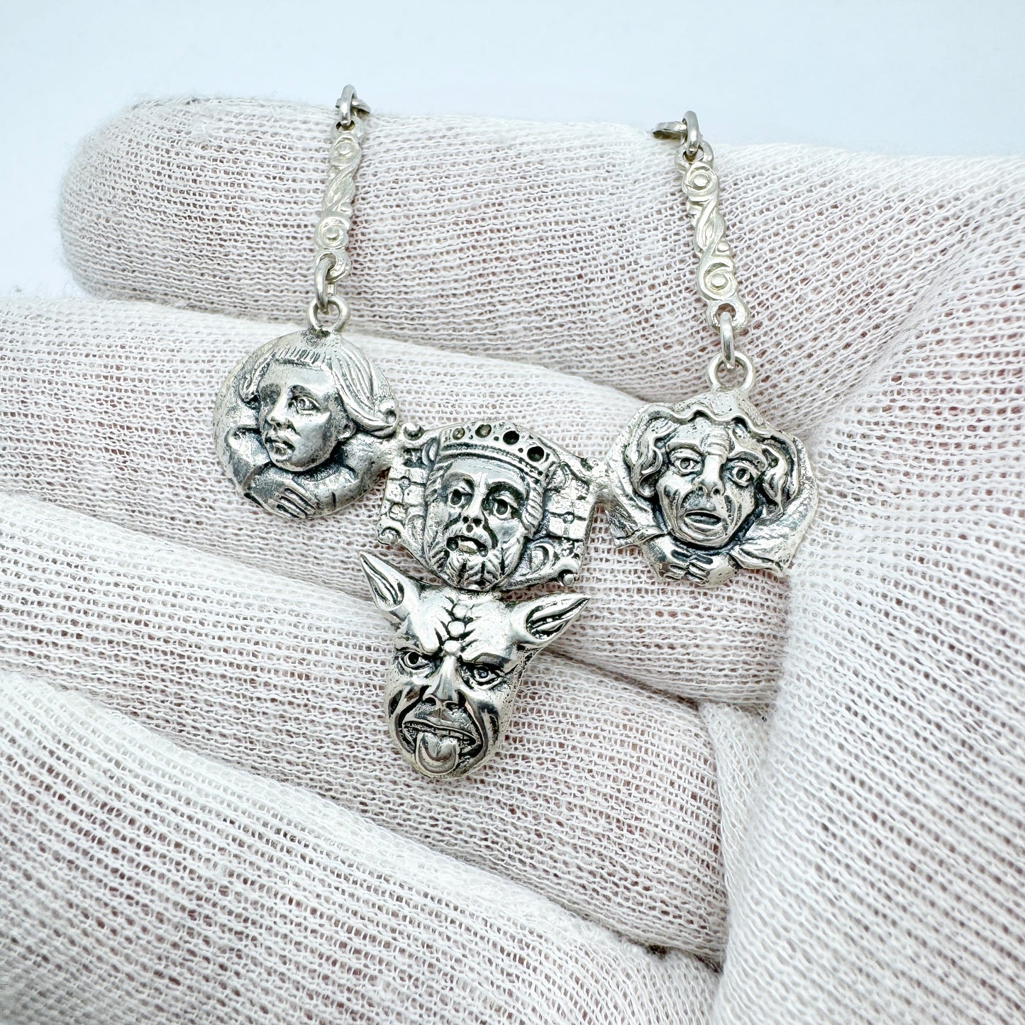 C&S, Norway c year 1900. Antique Solid Silver Faces Pendant Necklace.