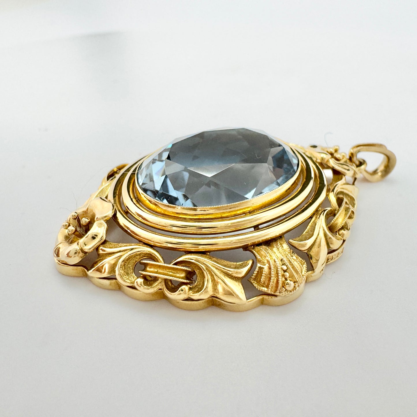 Sweden year 1944. Vintage 18k Gold Icy Blue Synthetic Spinel Pendant.