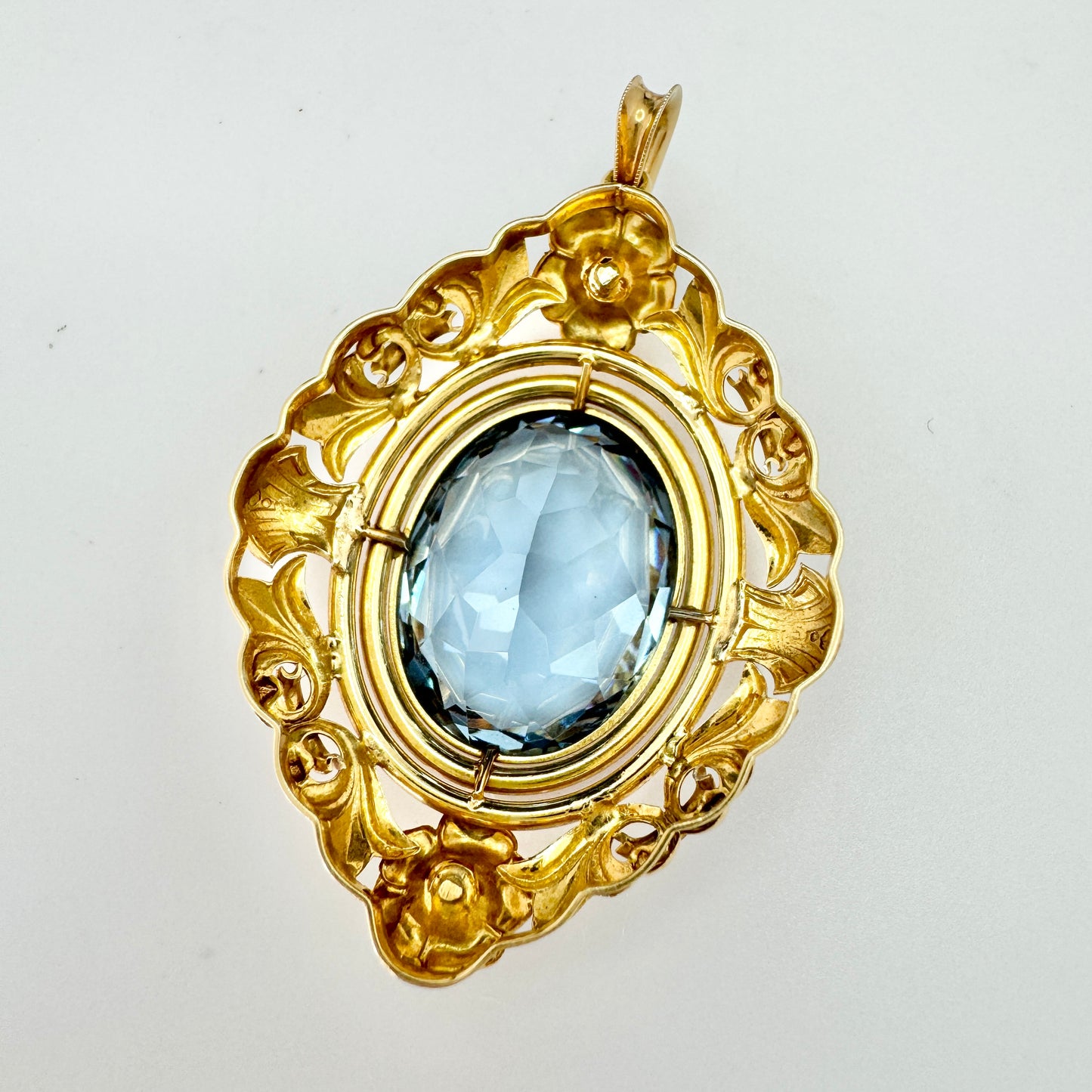 Sweden year 1944. Vintage 18k Gold Icy Blue Synthetic Spinel Pendant.