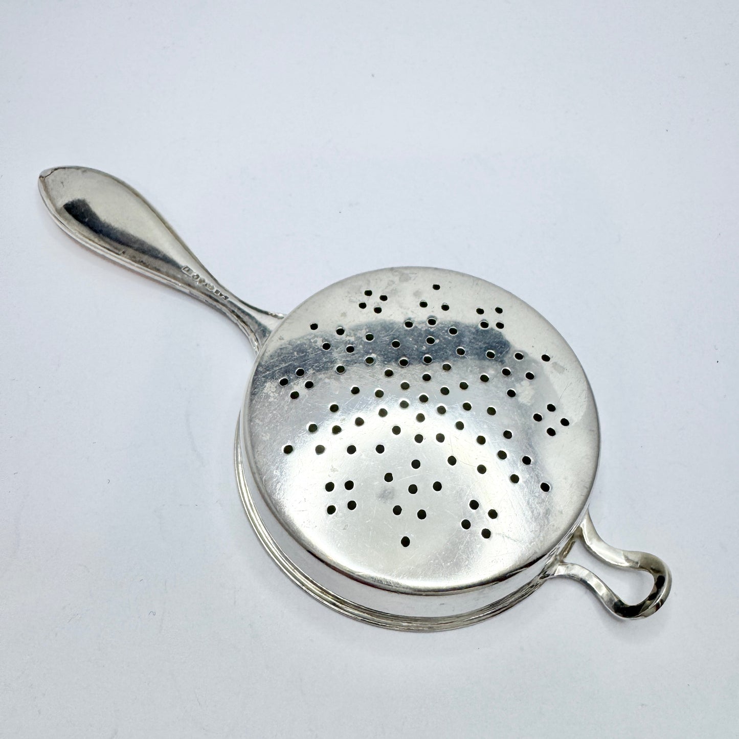 GAB, Sweden 1927. Art Deco Sterling Silver Tea Strainer.