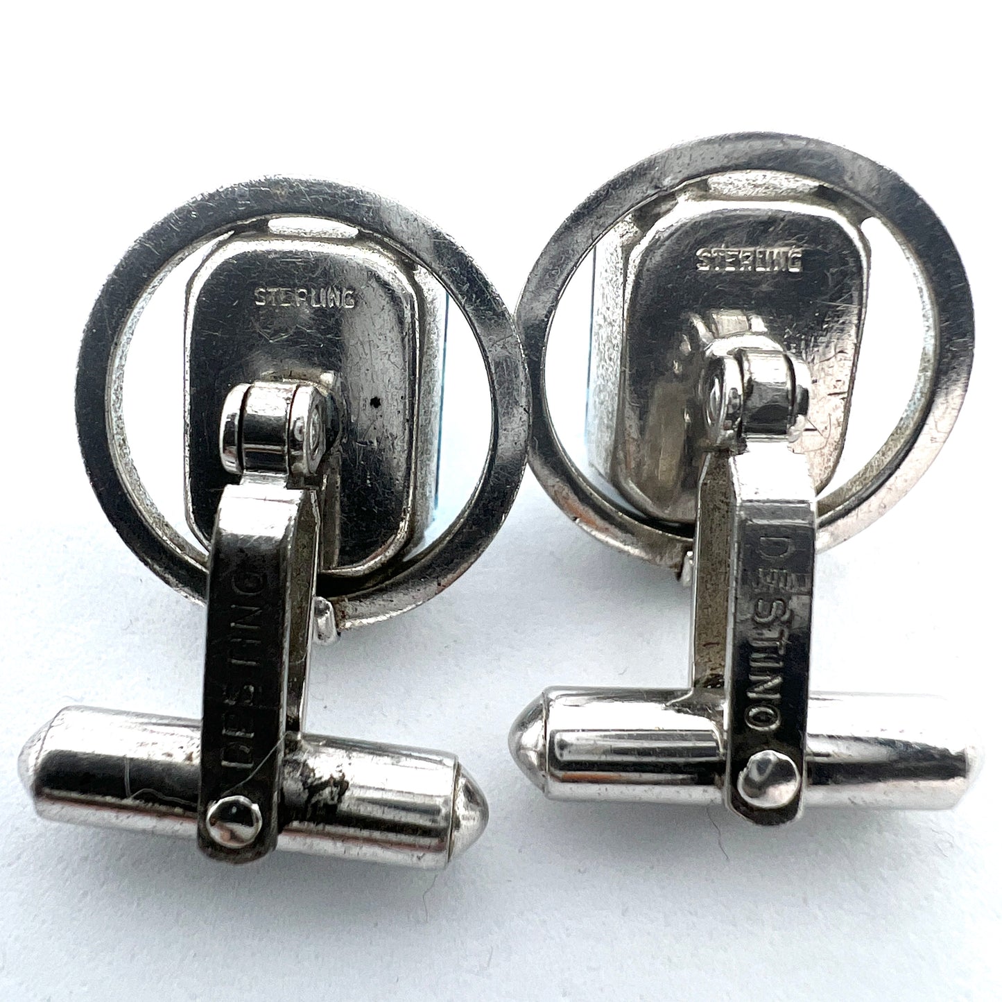 Phil Janzé and Destino. Two Pair of Silver Cufflinks.
