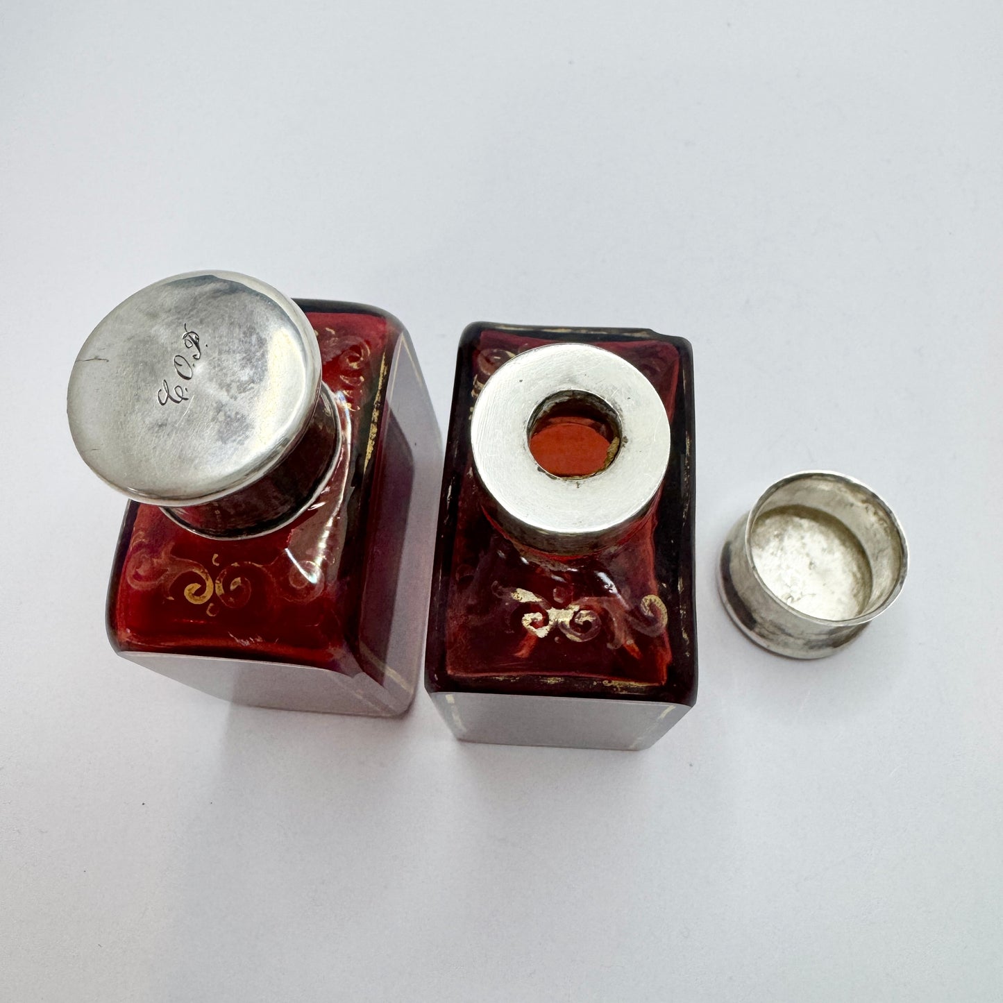 Stockholm 1858. Antique Victorian Ruby Glass Silver Top Pair of Perfume Bottles.