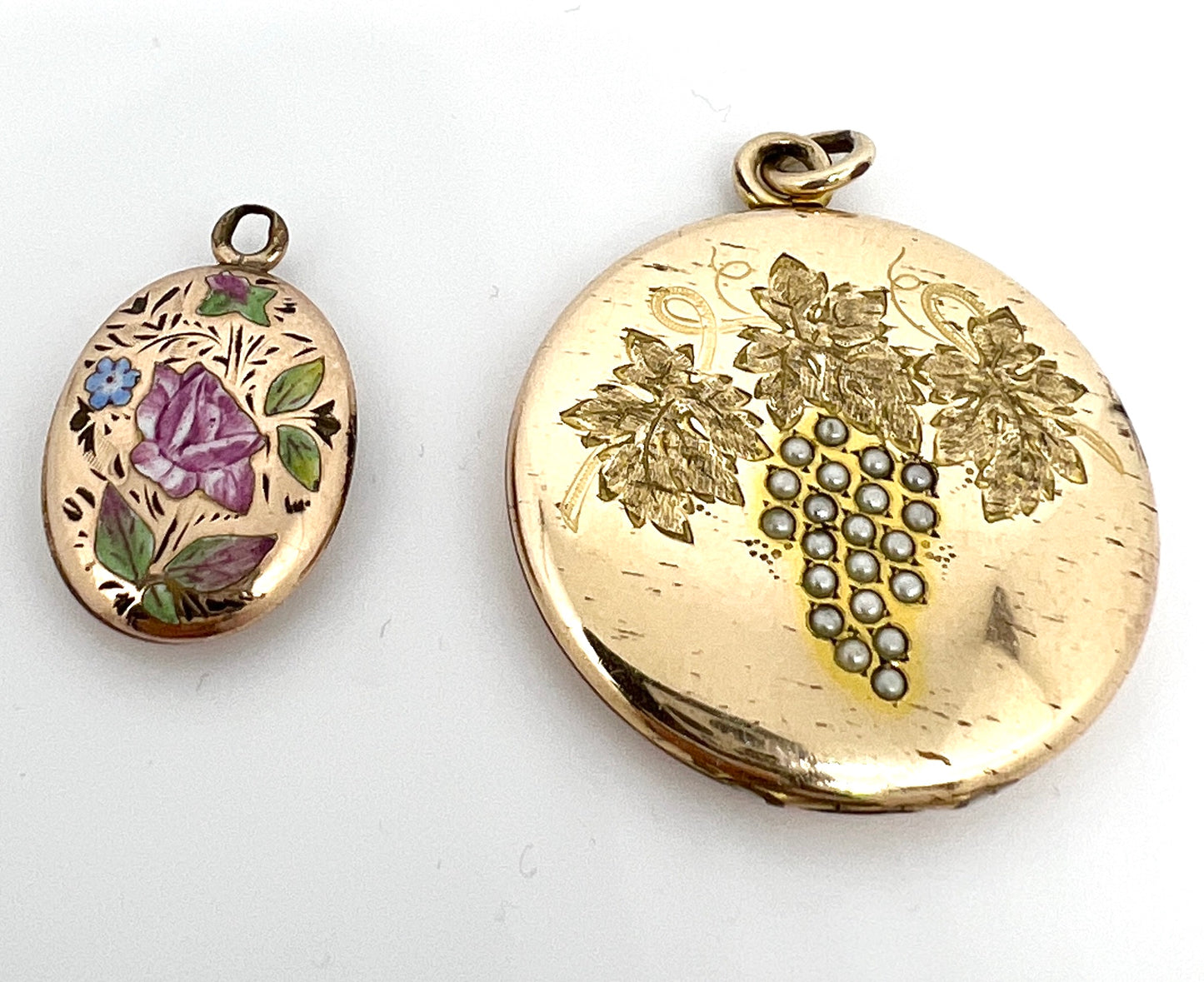 Two Antique Gilt Metal Locket Pendants.