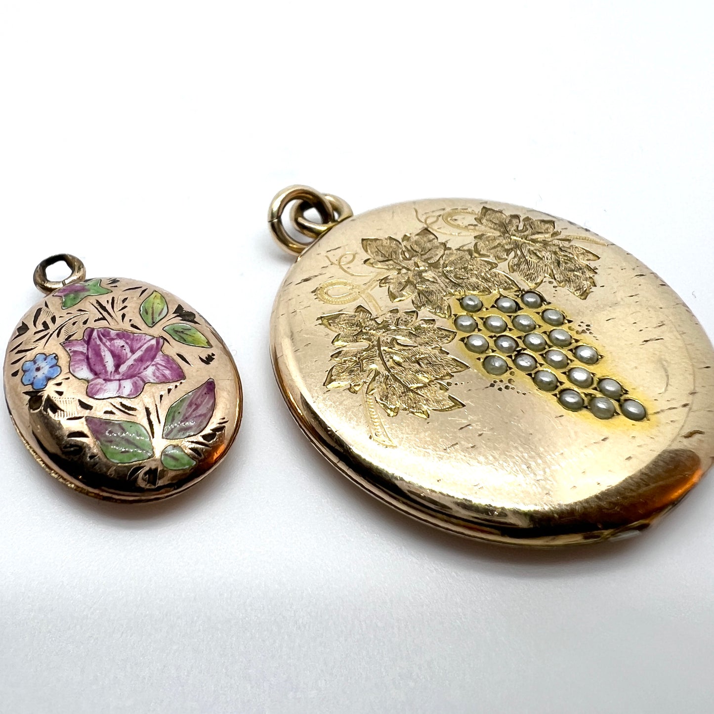 Two Antique Gilt Metal Locket Pendants.