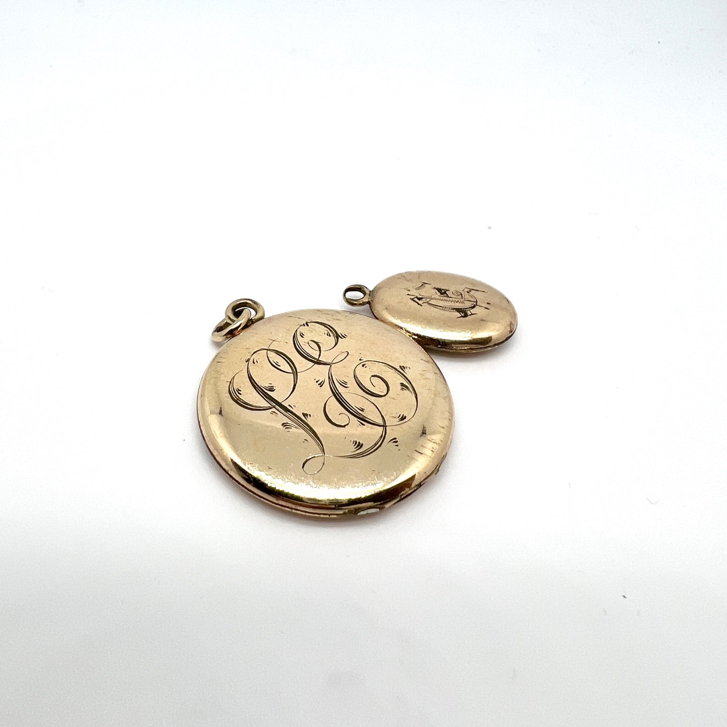 Two Antique Gilt Metal Locket Pendants.