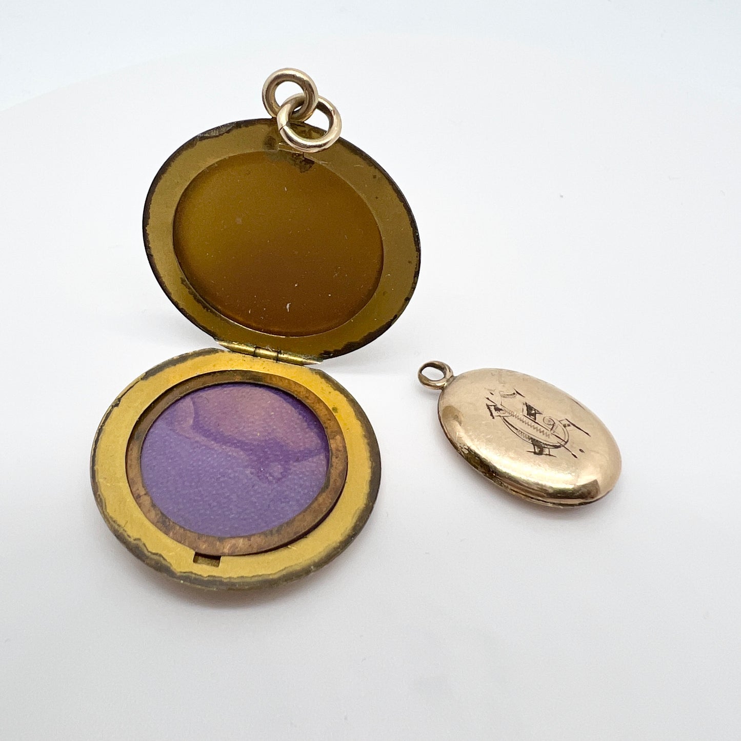 Two Antique Gilt Metal Locket Pendants.