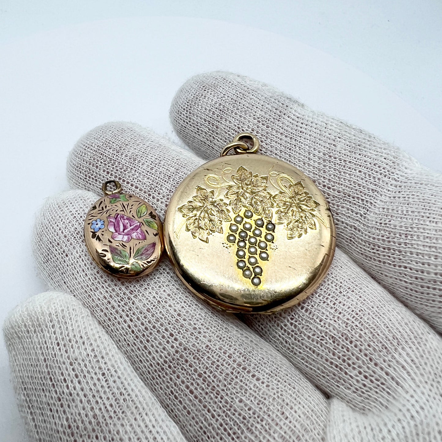 Two Antique Gilt Metal Locket Pendants.