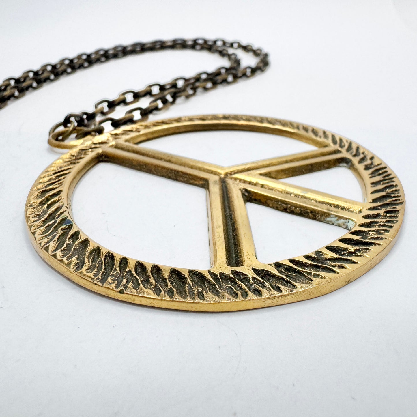 Gewe, Sweden 1970s. Huge Hippie-era Bronze Peace Symbol Pendant Necklace.