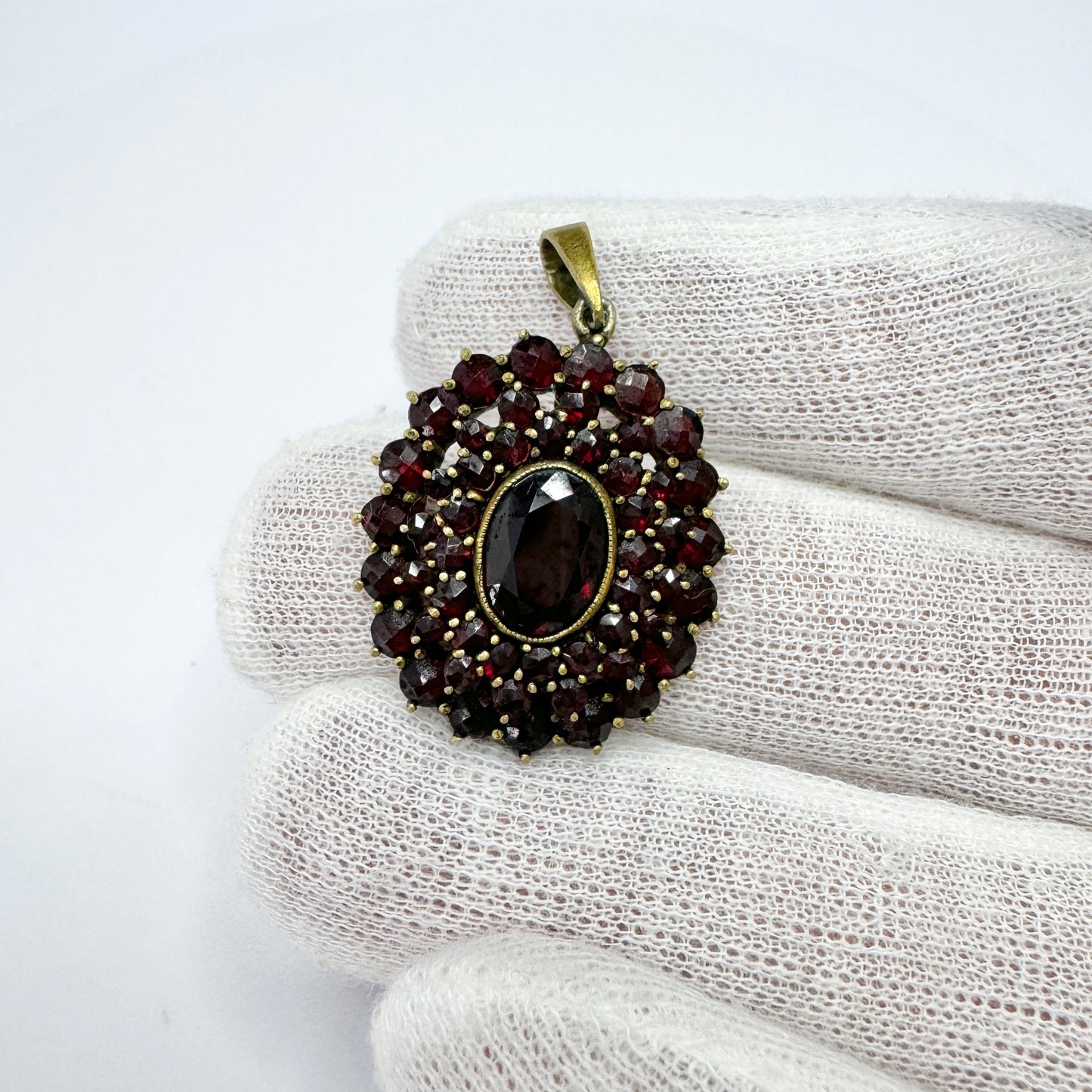 Early 1900s. Vintage Bohemian Garnet Gilt Metal Pendant.