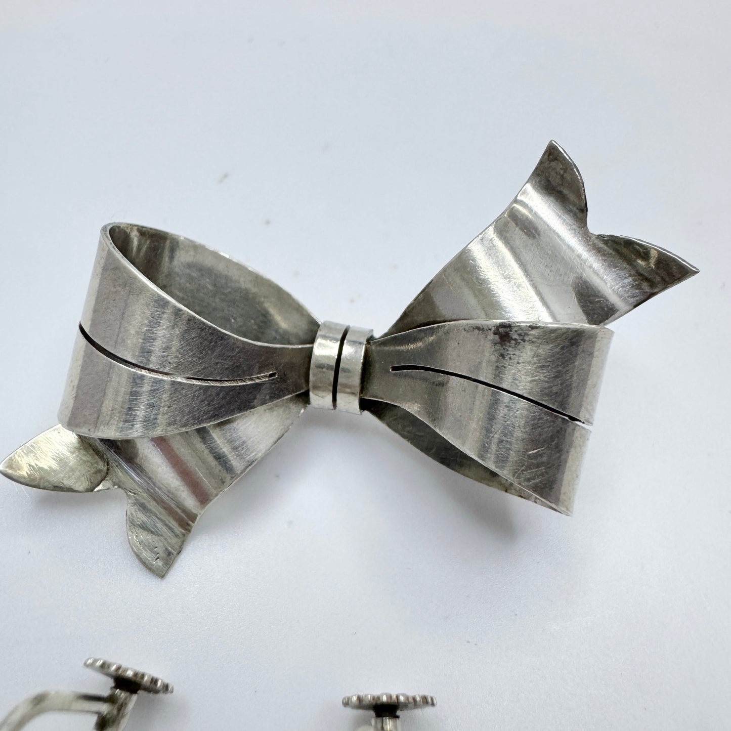 Sweden 1940s. Vintage Solid Silver Ribbon Brooch and Earrings