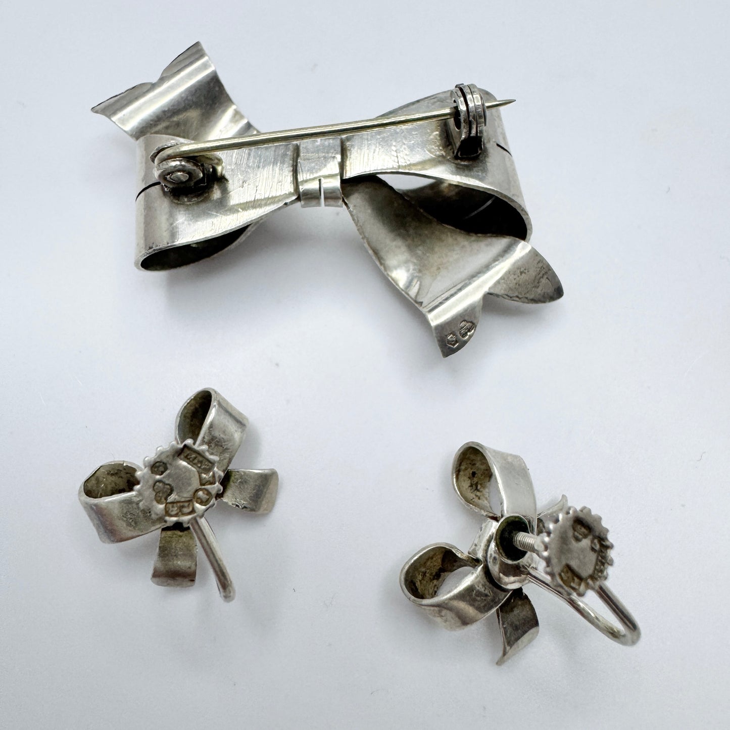 Sweden 1940s. Vintage Solid Silver Ribbon Brooch and Earrings