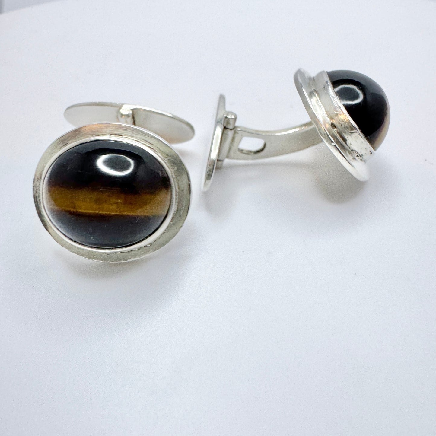 Kaplan, Sweden 1952. Vintage Sterling Silver Cat's Eye Cufflinks.