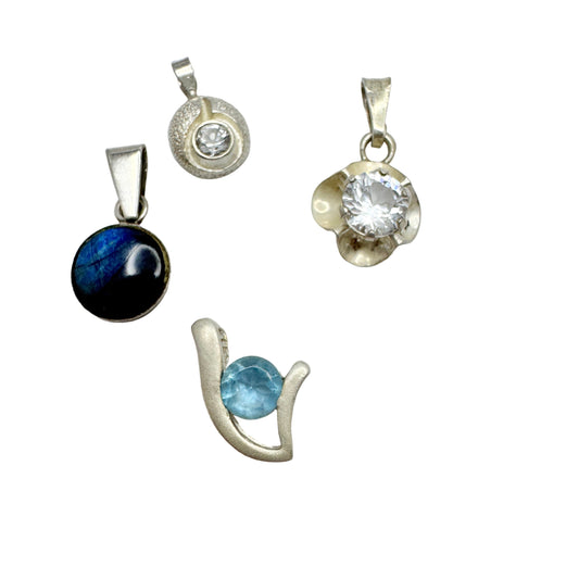 Finland. 4 Small Vintage Solid Silver Pendants.